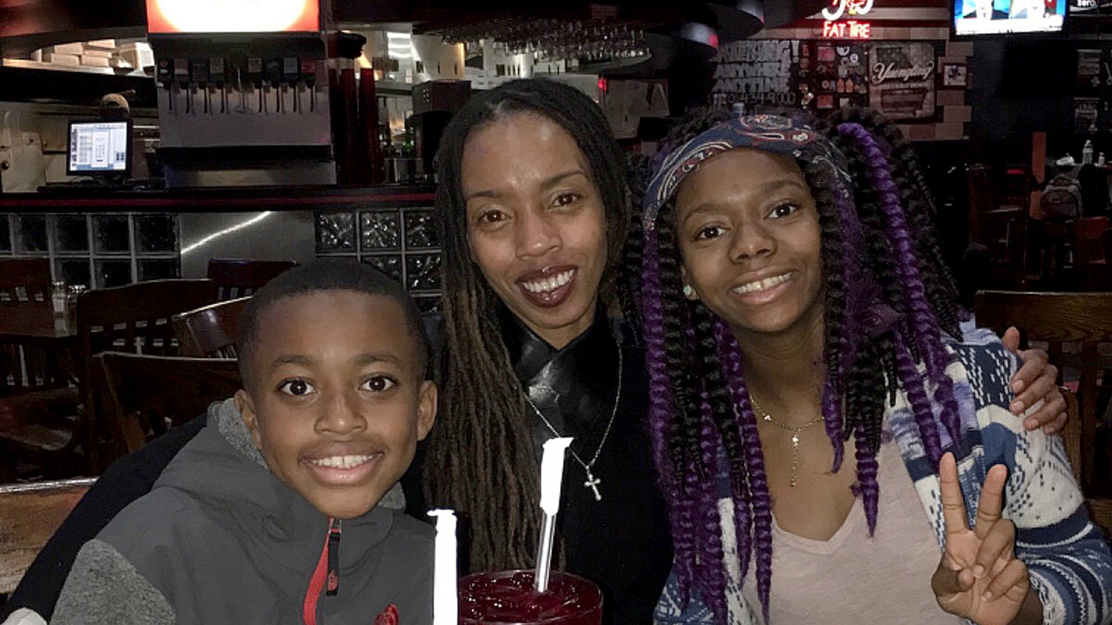 Claudine Hargrove, 38, was stabbed to death Aug. 11 inside a Gwinnett County hotel room two days after her birthday. She is survived by her 11-year-old son Naiyim and her 15-year-old daughter Nya. (Family provided photo)
