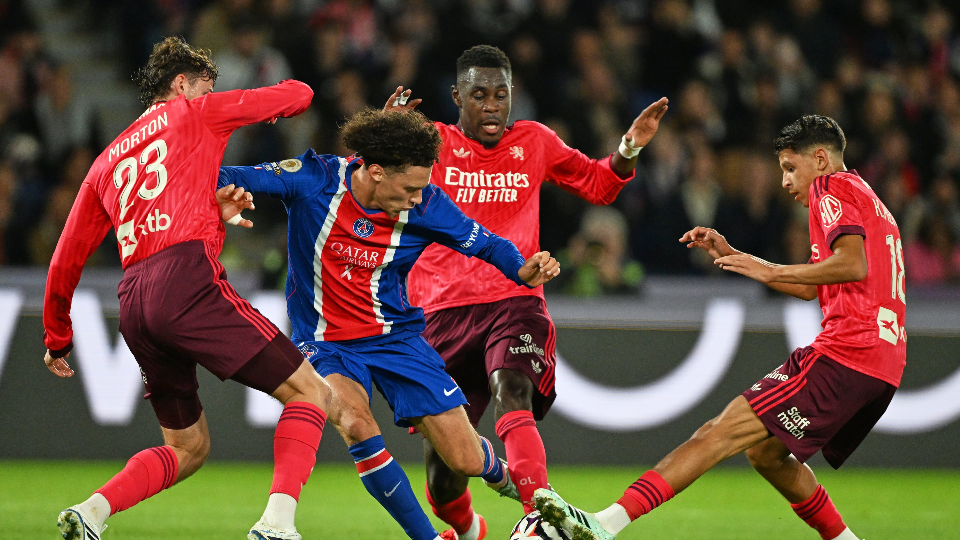 PSG's Maghnes Akliouche, centre, in action during the French League One soccer match between Paris Saint-Germain and Lyon in Paris, Monday, Oct. 26, 2026. (AP Photo/Emma Da Silva)