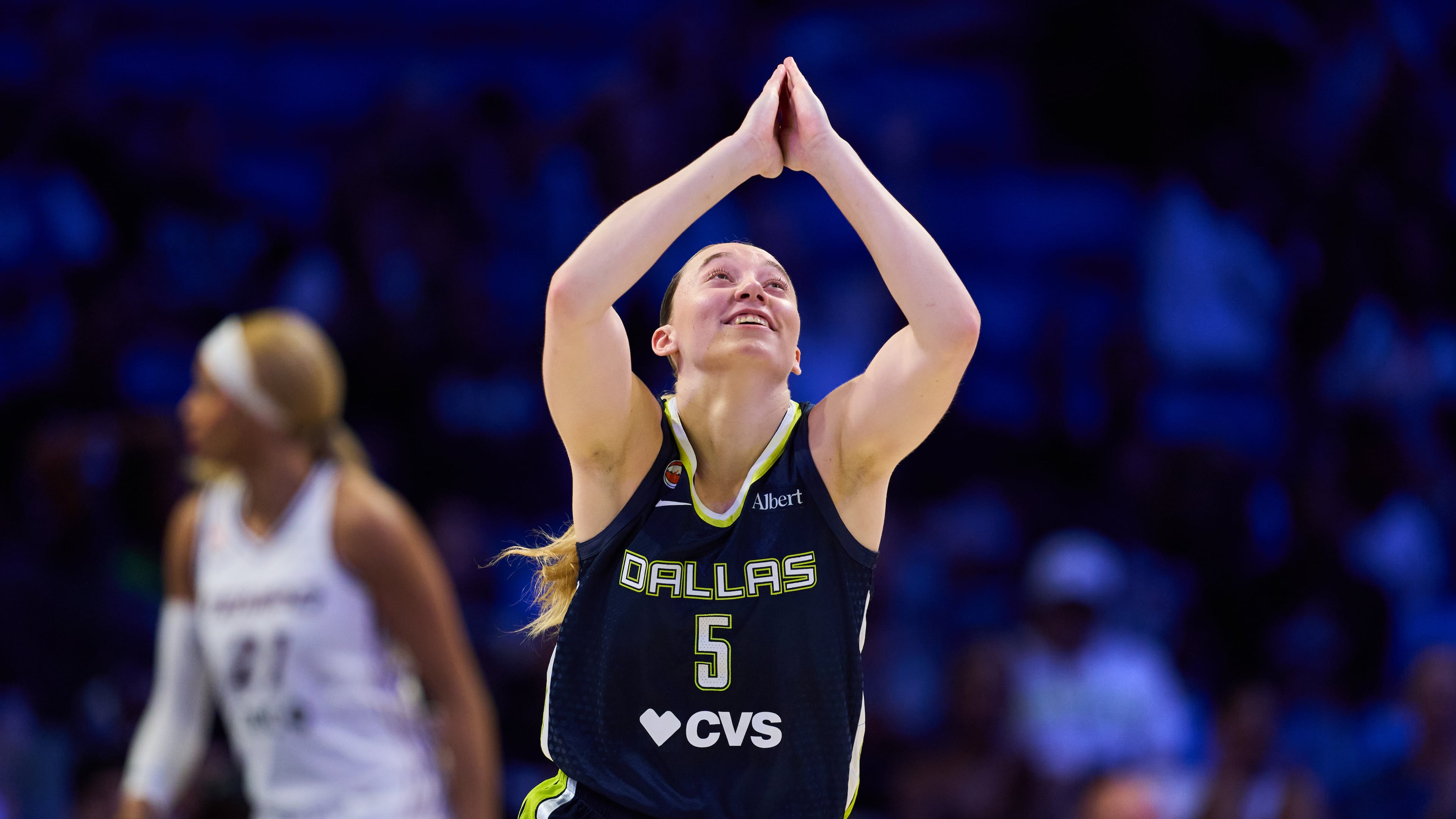 Dallas Wings' Paige Bueckers celebrates after sinking a basket in the second half of a WNBA basketball game against the Toronto Tempo in Arlington, Texas, Wednesday, Aug. 12, 2026. (AP Photo/Tony Gutierrez)