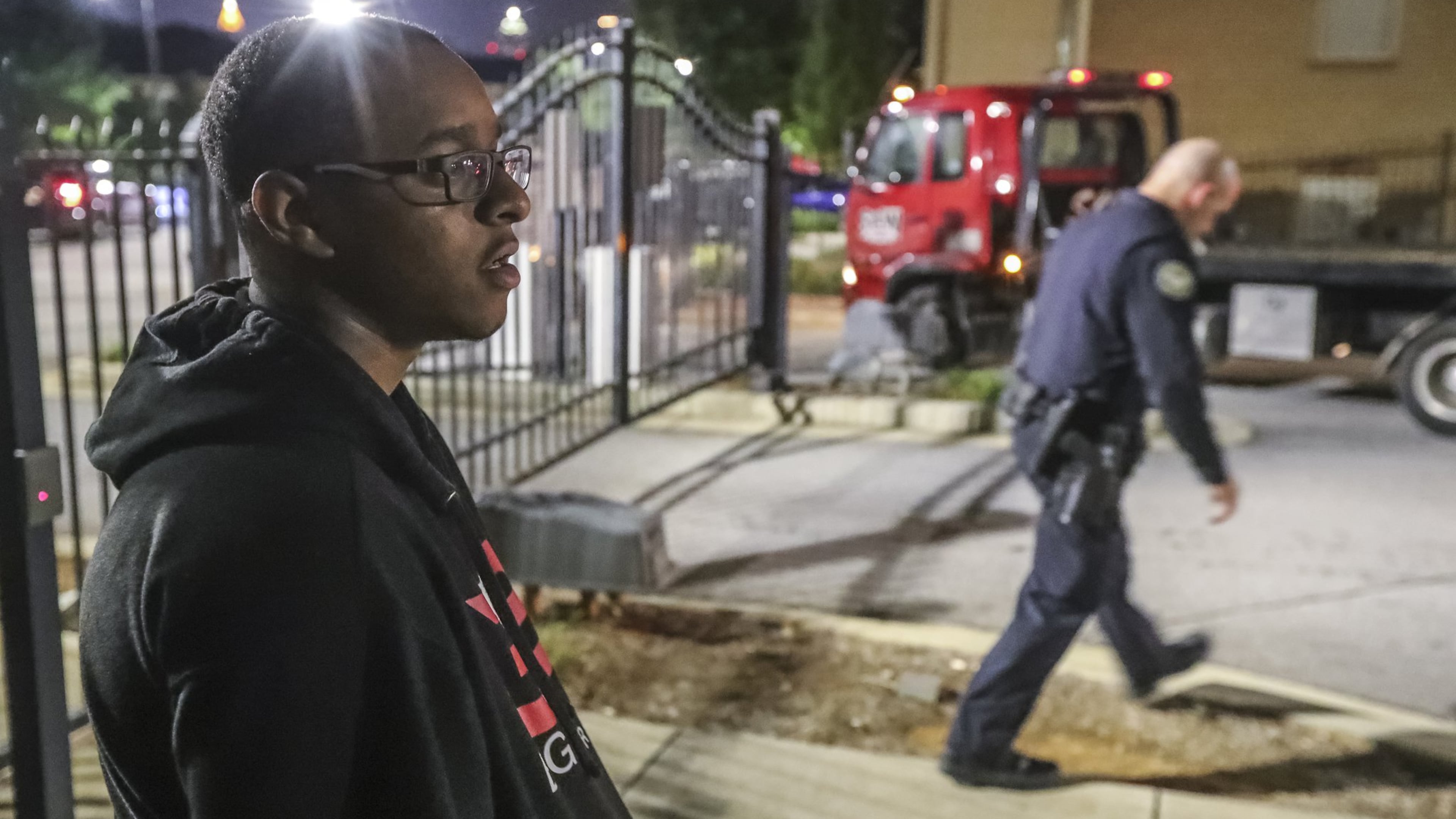 October 2, 2018 Atlanta: Morehouse student, Deaven Rector, 19, waits for a tow truck to remove his car from Ashley Collegetown 387 Joseph E Lowery Blvd SW in Atlanta after he was carjacked. The Morehouse College student was not injured in the carjacking that took place early Tuesday morning after he left a campus library in southwest Atlanta. His car was later located by police.