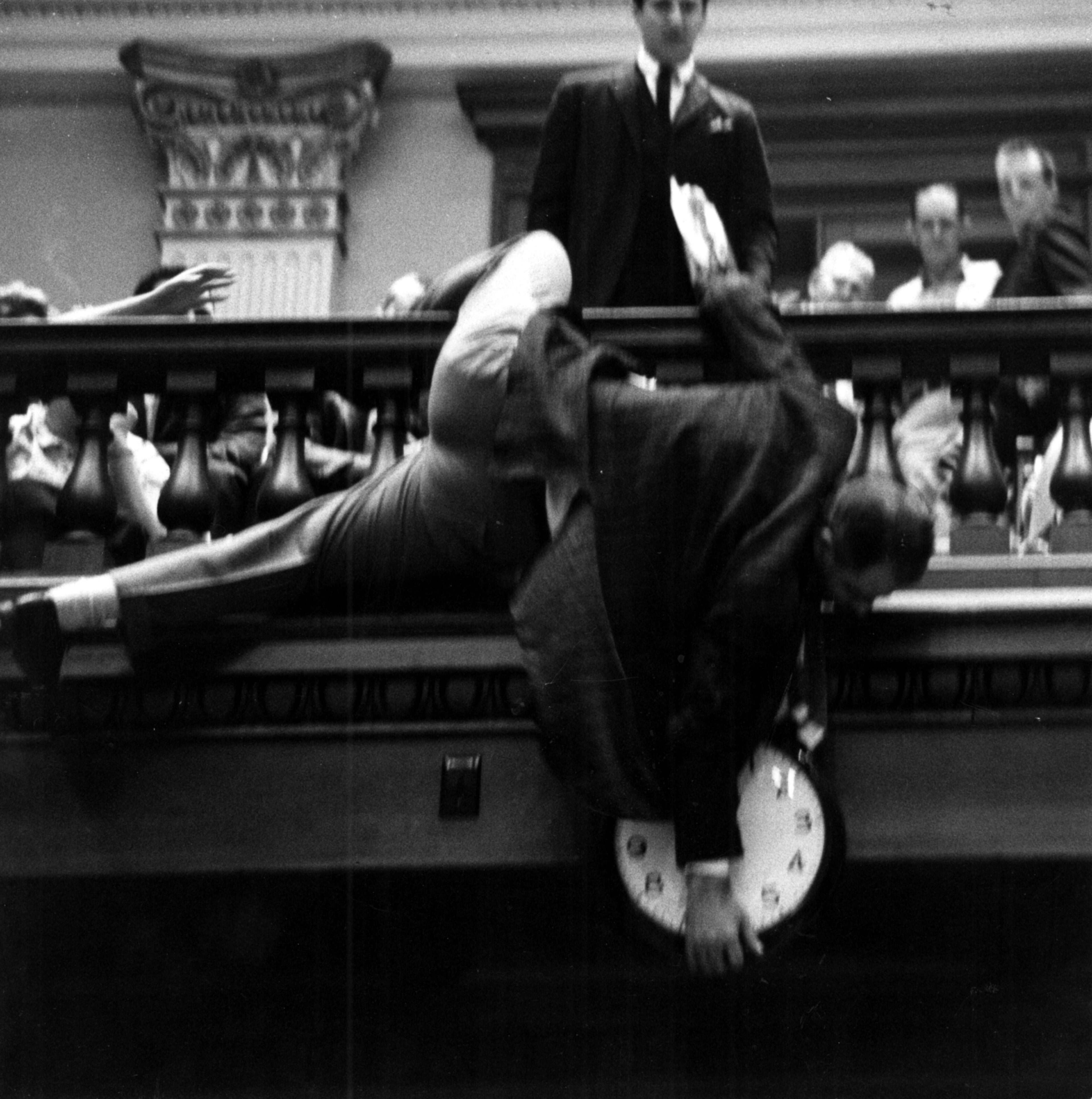 Feb. 21 -- During a 1964 speech on re-apportionment, Rep. Denmark Groover (D-Macon) nearly fell over the state House railing trying to adjust the hands of the clock to keep it from reaching the mandatory hour of adjournment. The clock ended up falling.