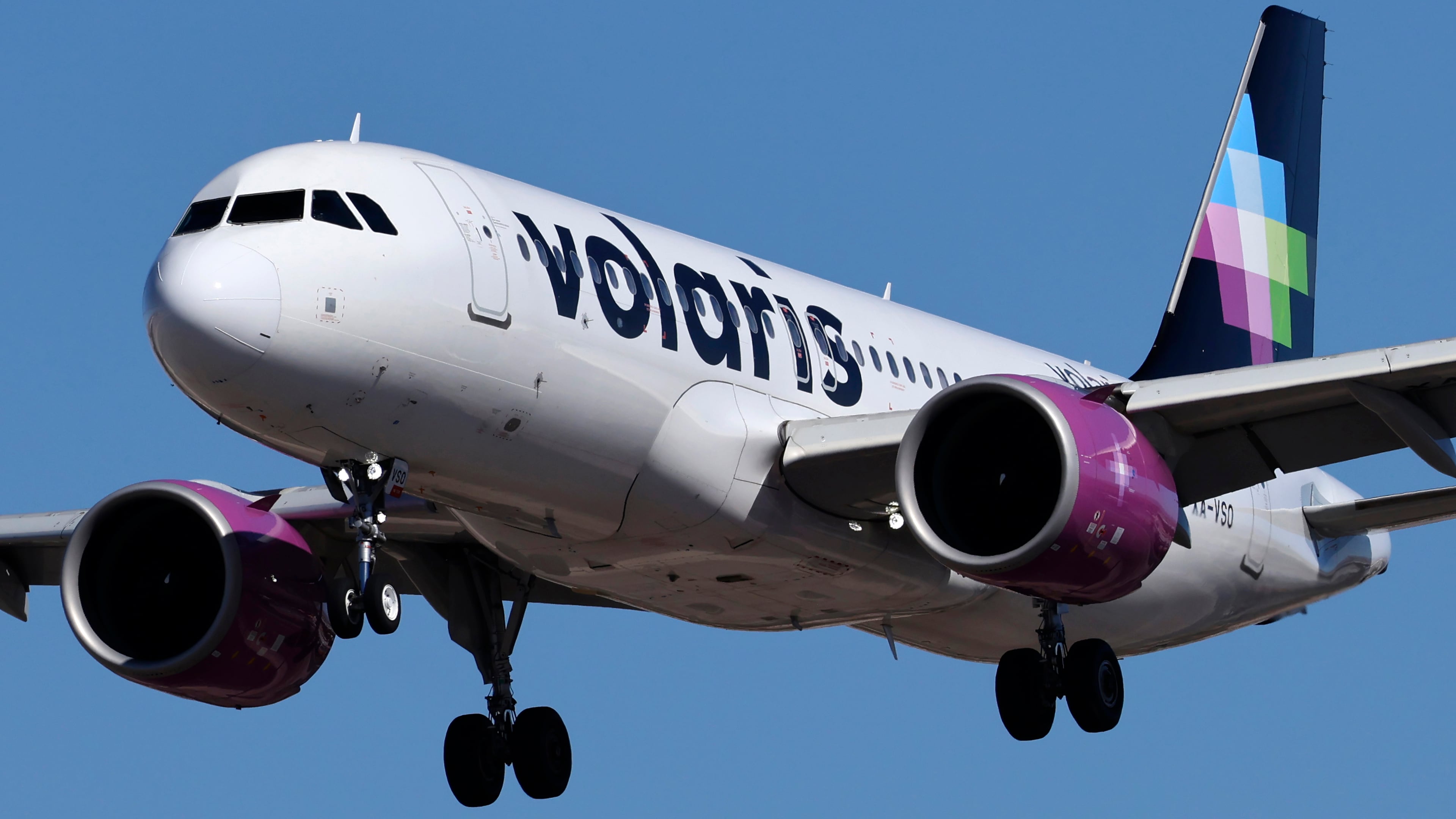 An Airbus A320 jetliner, belonging to low-cost Mexican carrier Volaris, lands at Harry Reid International Airport in Las Vegas in 2024. The discount airline announced it will launch service to Atlanta starting next month, adding to the competition on flights to Mexico. (Larry MacDougal/AP)