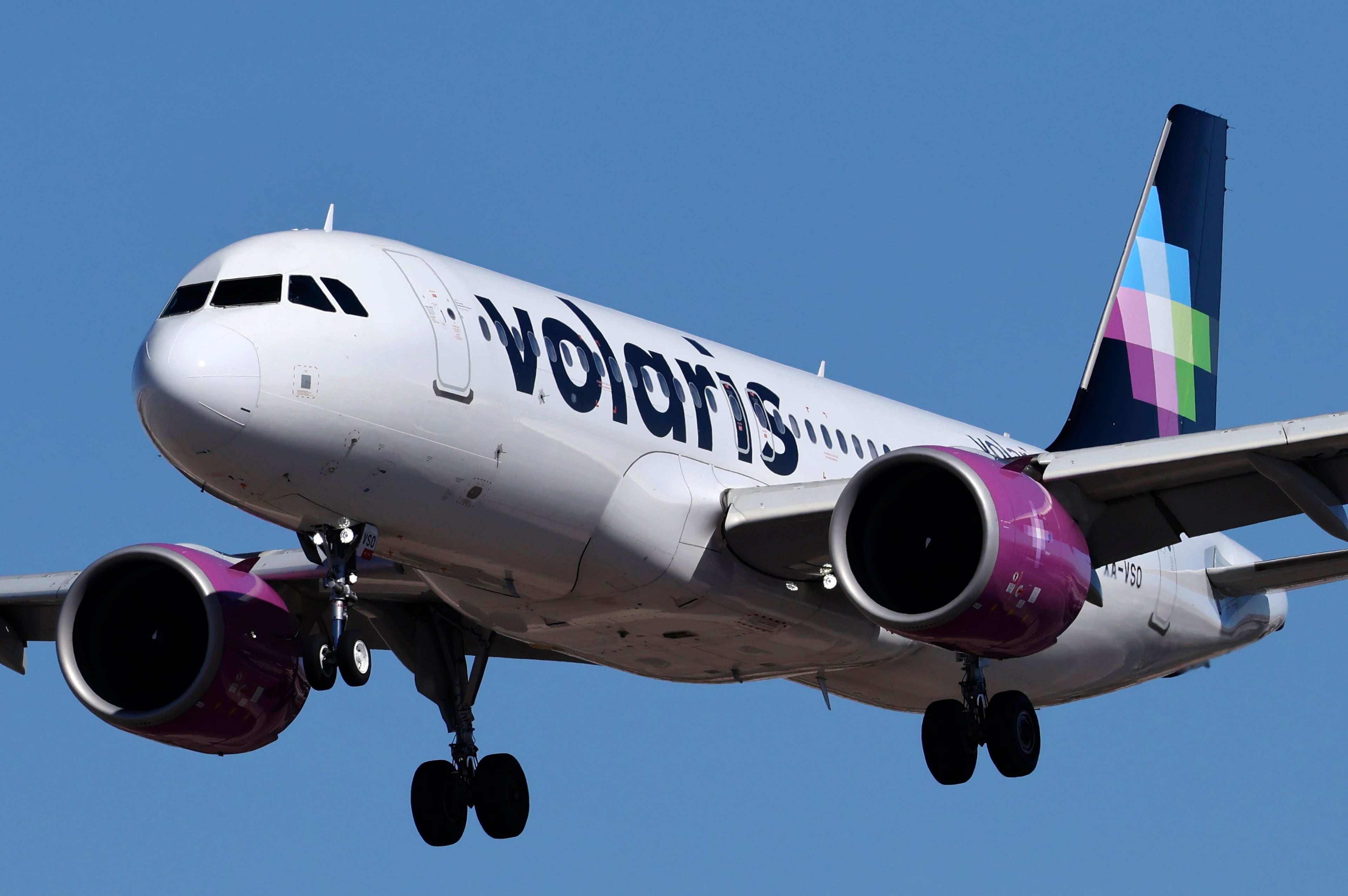 An Airbus A320 jetliner, belonging to low-cost Mexican carrier Volaris, lands at Harry Reid International Airport in Las Vegas in 2024. The discount airline announced it will launch service to Atlanta starting next month, adding to the competition on flights to Mexico. (Larry MacDougal/AP)