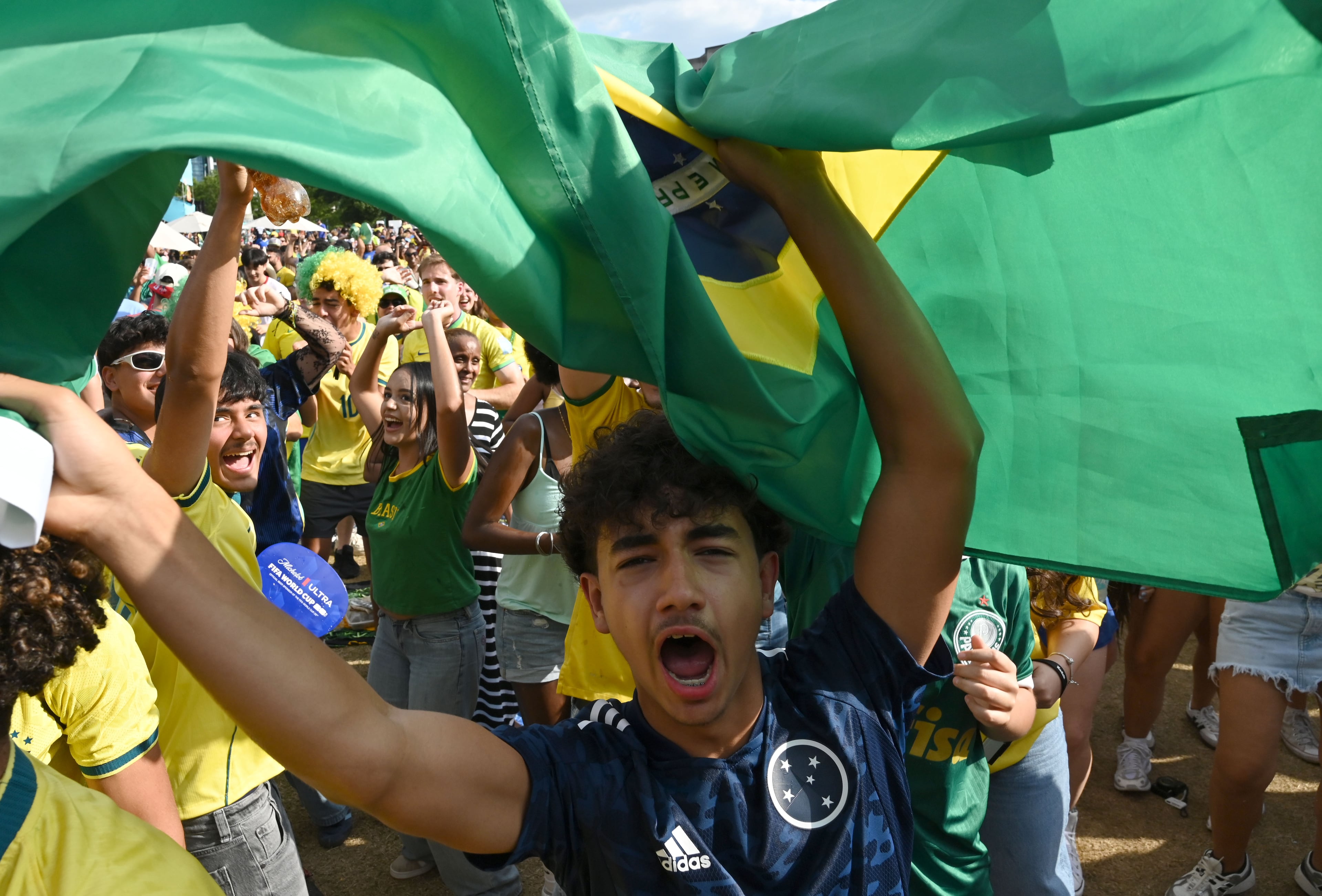 Brazil fans react to a goal as they gather to watch the match between Brazil and Scotland at the FIFA Fan Festival in Centennial Olympic Park on Wednesday, June 24, 2026, in Atlanta. (Hyosub Shin/AJC)