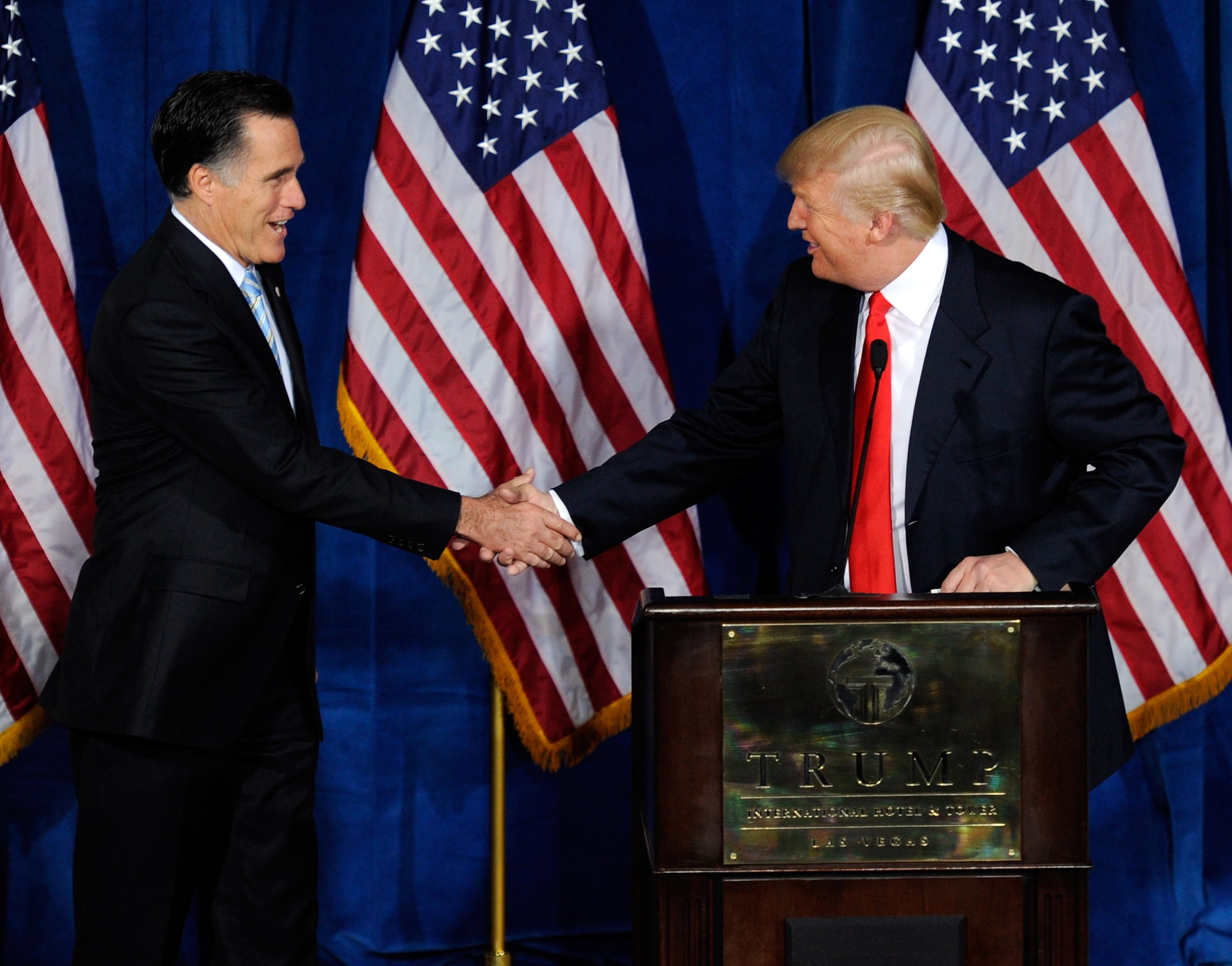 LAS VEGAS, NV - FEBRUARY 02: Republican presidential candidate, former Massachusetts Gov. Mitt Romney (L) and Donald Trump shake hands during a news conference held by Trump to endorse Romney for president at the Trump International Hotel & Tower Las Vegas February 2, 2012 in Las Vegas, Nevada. Romney came in first in the Florida primary on January 31 and is looking ahead to Nevada's caucus on February 4. (Photo by Ethan Miller/Getty Images)