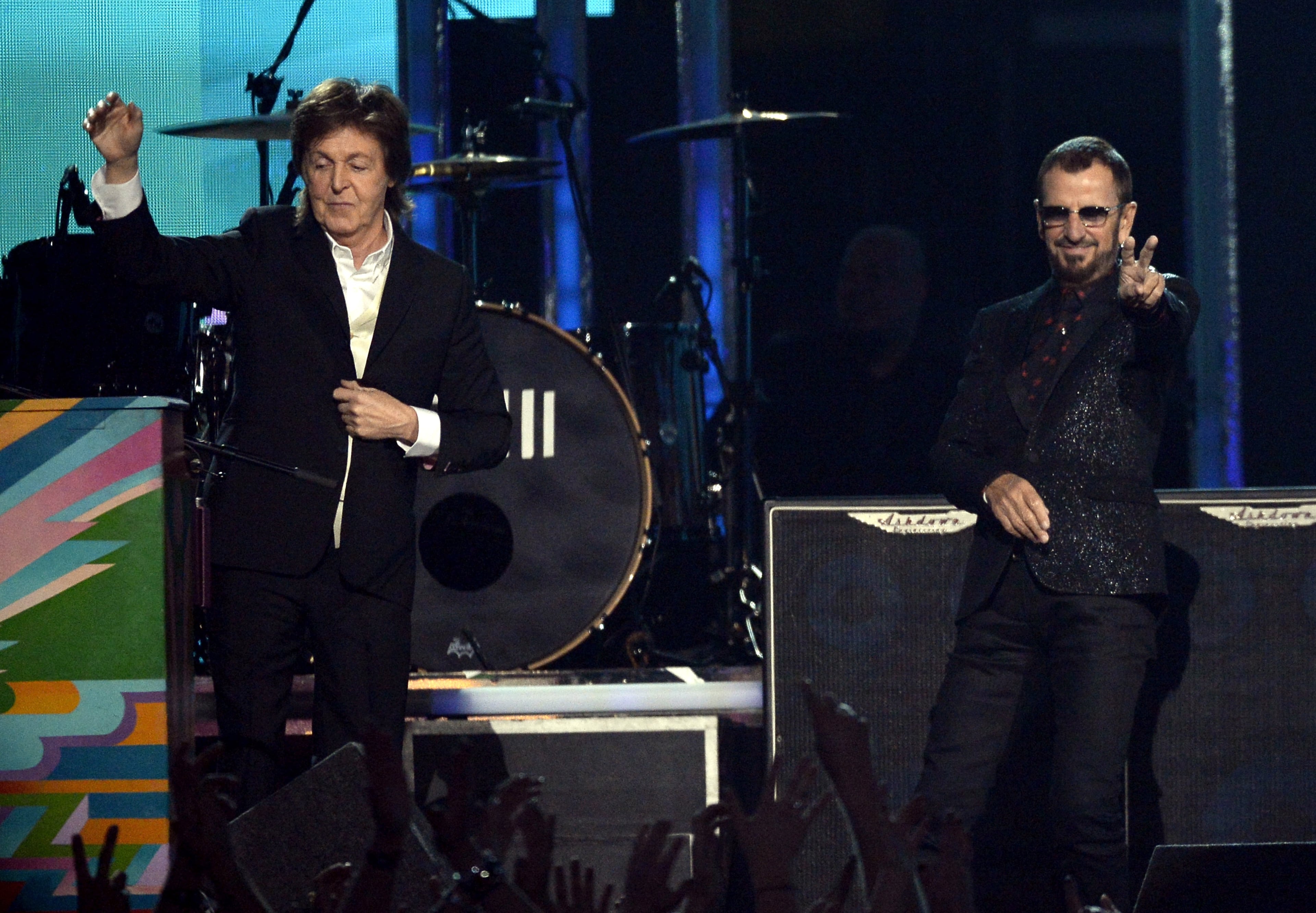 LOS ANGELES, CA - JANUARY 26: Musicians Paul McCartney (L) and Ringo Starr of The Beatles perform onstage during the 56th GRAMMY Awards at Staples Center on January 26, 2014 in Los Angeles, California. (Photo by Kevork Djansezian/Getty Images)