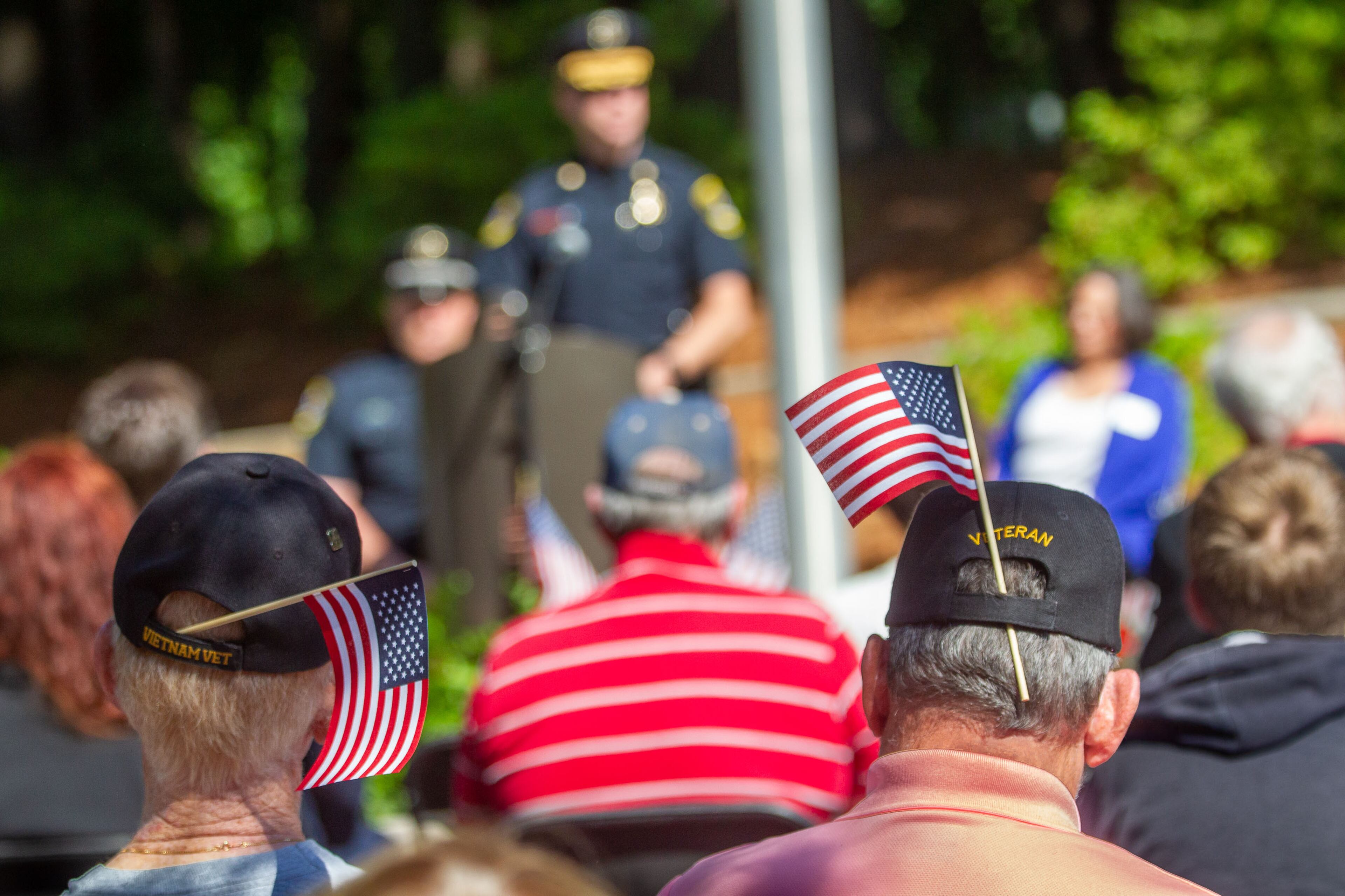 People listen to the speakers during the city of Dunwoody remembrance ceremony at Brook Run Park Monday, May 31, 2021. STEVE SCHAEFER FOR THE ATLANTA JOURNAL-CONSTITUTION