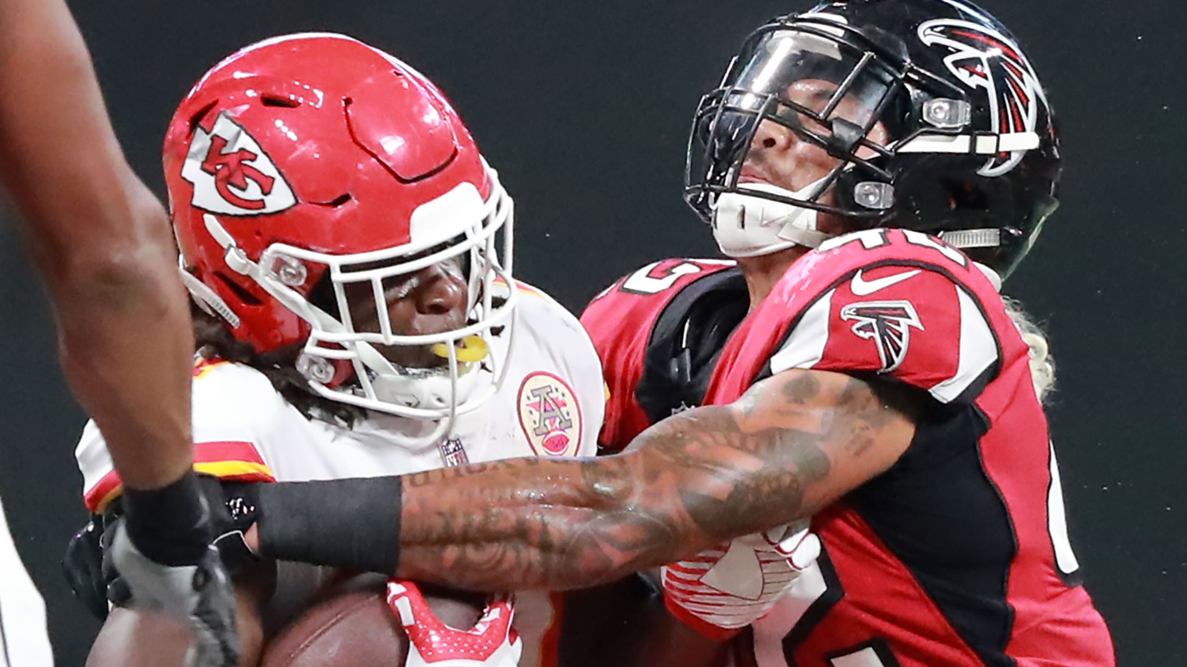 Falcons linebacker Duke Riley tackles Chiefs running back Kareem Hunt during the first half of their exhibition game Friday, Aug. 17, 2018, at Mercedes-Benz Stadium in Atlanta.
