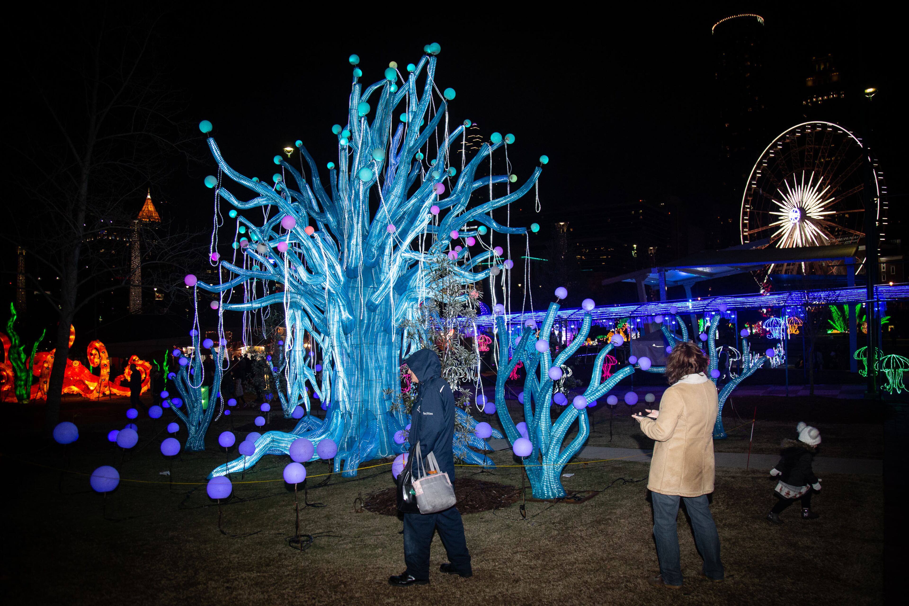 Fairgoers walk by the Fairy Tree lantern during the Chinese Lantern Festival at Centennial Olympic Park Saturday, January 04, 2020. STEVE SCHAEFER / SPECIAL TO THE AJC