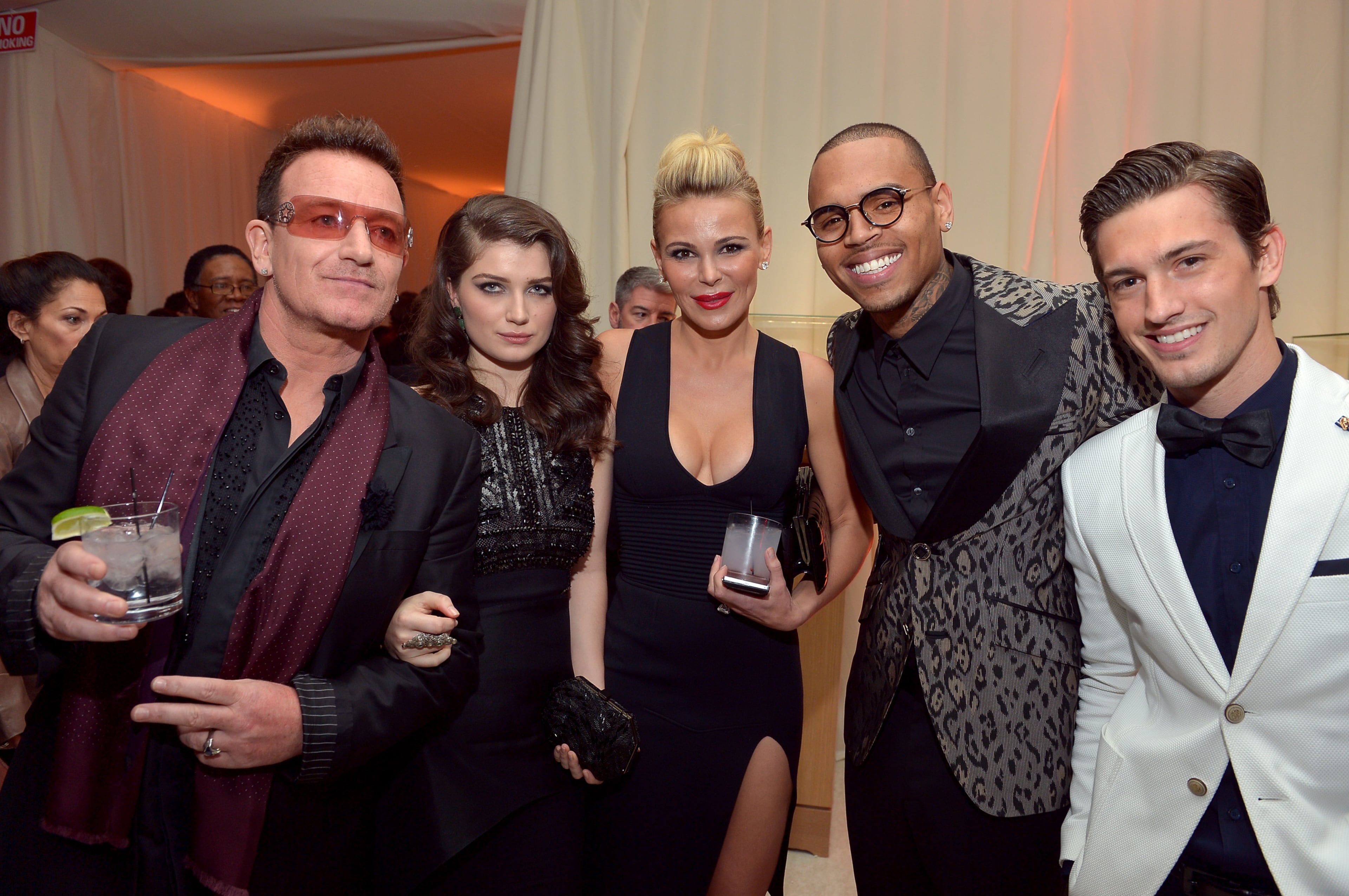 (L-R) Singer Bono, actress Eve Hewson, Chairman and Founder of Neuro Diana Jenkins and singers Chris Brown and Asher Monroe attend Neuro at 21st Annual Elton John AIDS Foundation Academy Awards Viewing Party at West Hollywood Park on February 24, 2013 in West Hollywood, California. (Photo by Charley Gallay/Getty Images for Neuro)