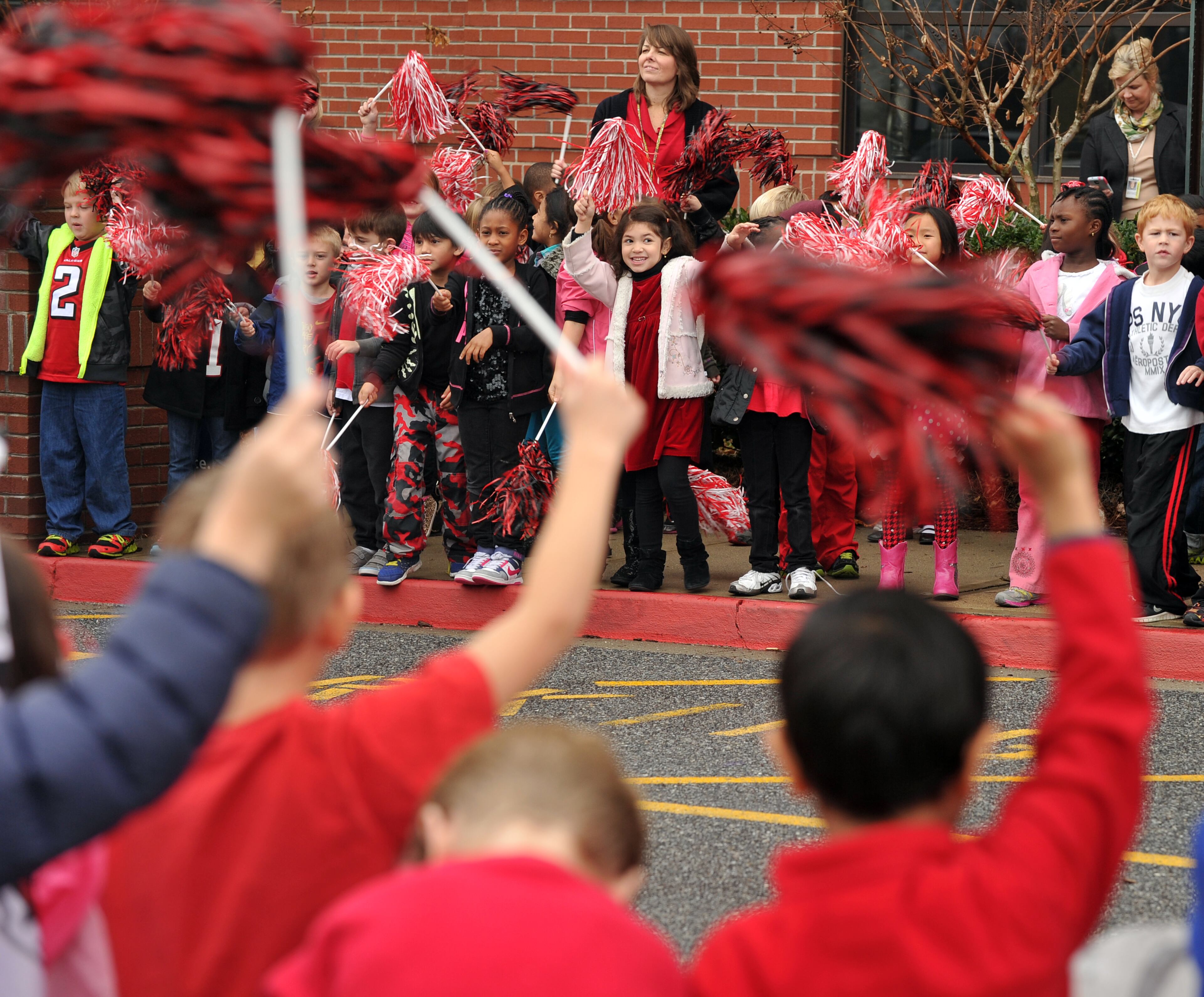 Students at Shiloh Point Elementary await the arrival of Atlanta Falcons running back Steve Jackson, Freddie Falcon and two Atlanta Falcon cheerleaders. The visit celebrated the school's achievements in the NFL PLAY 60 program. At the beginning of the football season schools were asked to participate in the NFL health and fitness initiative, PLAY 60 Super School contest. Schools submitted three essays explaining their commitment to youth health and wellness and their school's plan for teaching students the importance of physical education and nutrition. Shiloh Point was the winning school in the Falcon's market and received a $10,000 grant for health and wellness programming or equipment.