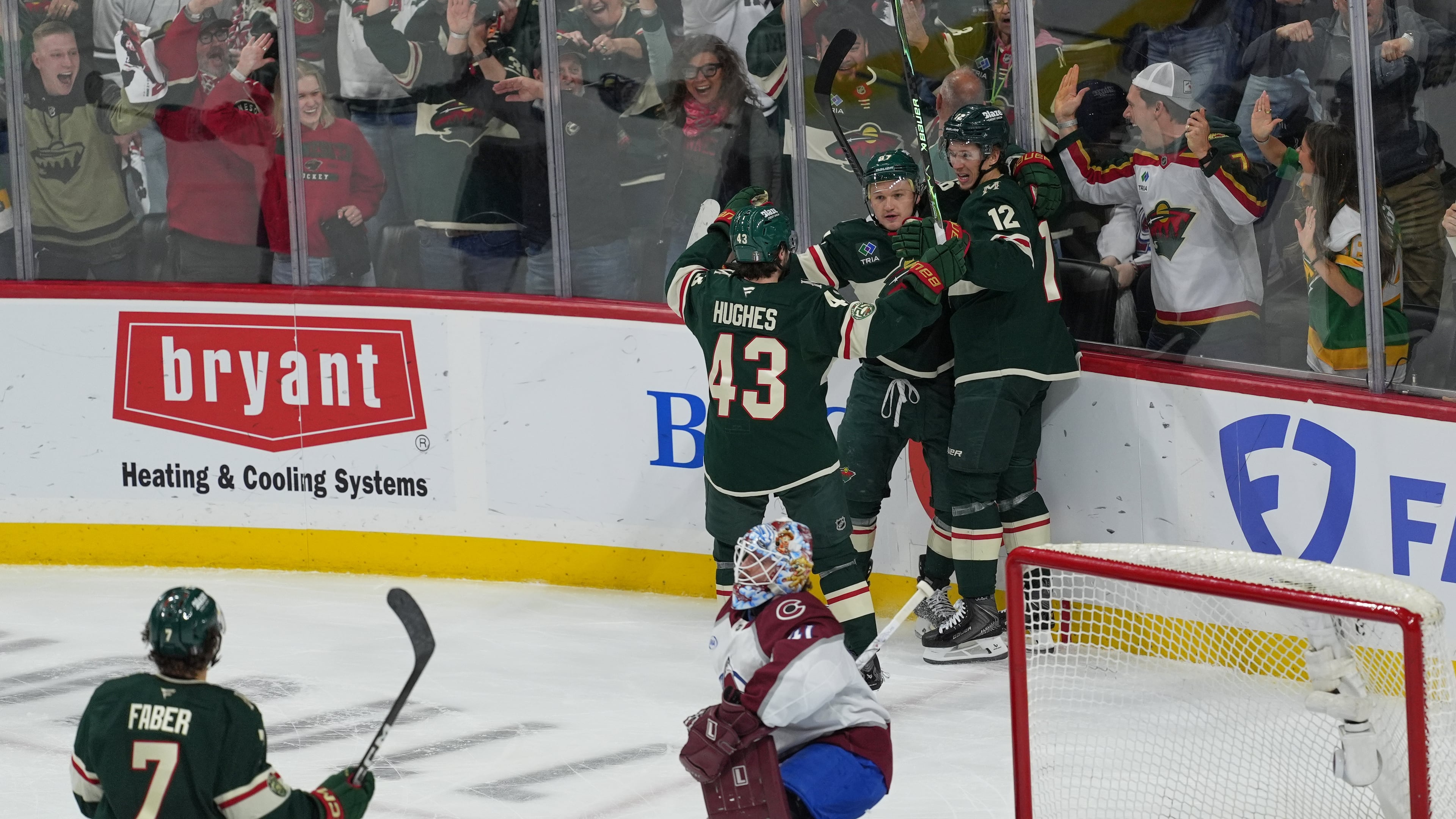 Minnesota Wild left wing Kirill Kaprizov (97) celebrates with teammates after scoring during the first period of Game 3 of an NHL Stanley Cup hockey second-round playoff series against the Colorado Avalanche, Saturday, May 9, 2026, in St. Paul, Minn. (AP Photo/Abbie Parr)