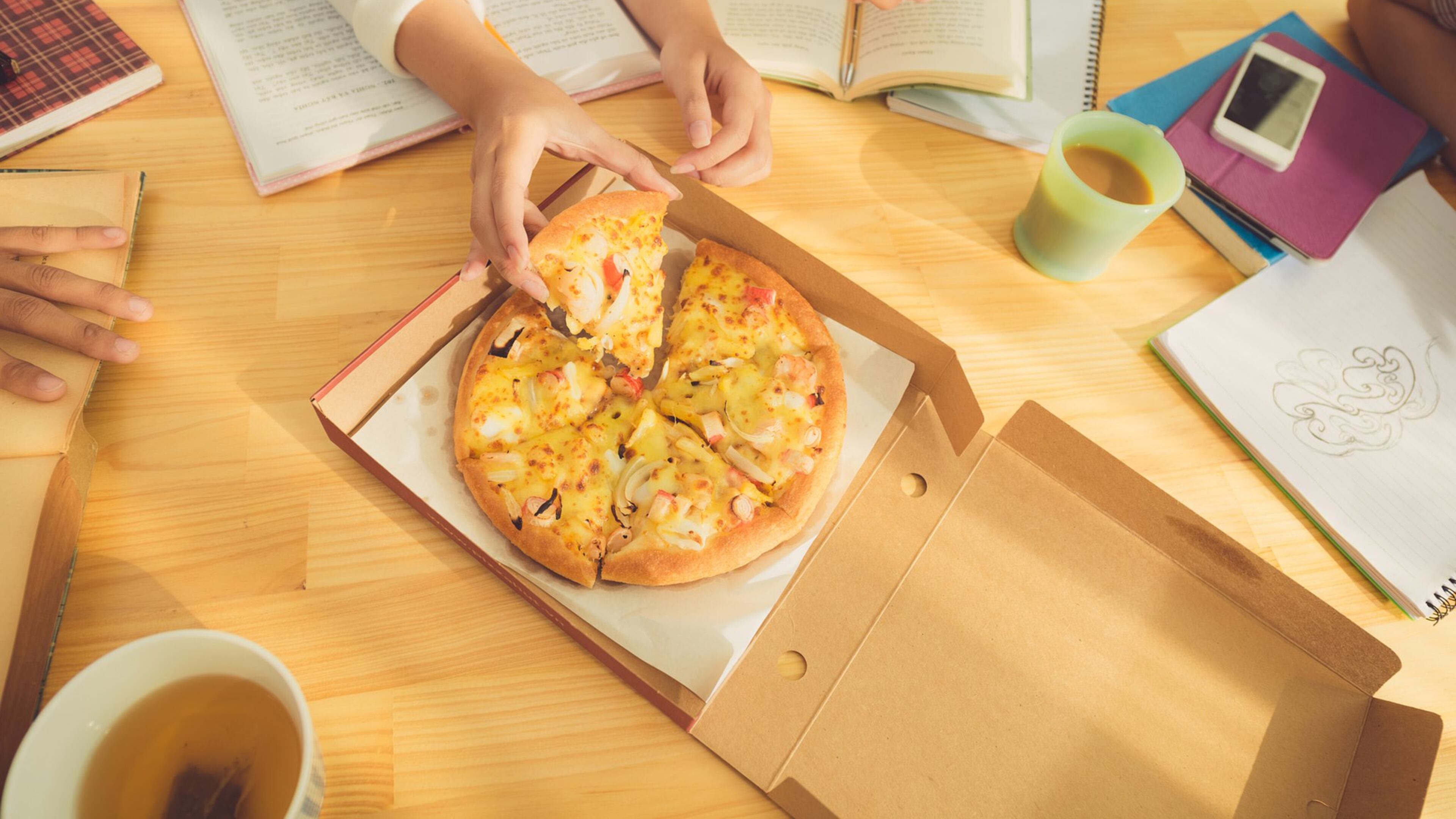 Leftover pizza would make a healthier breakfast than the boxed sugary cereals you grew up with. (Dreamstime)