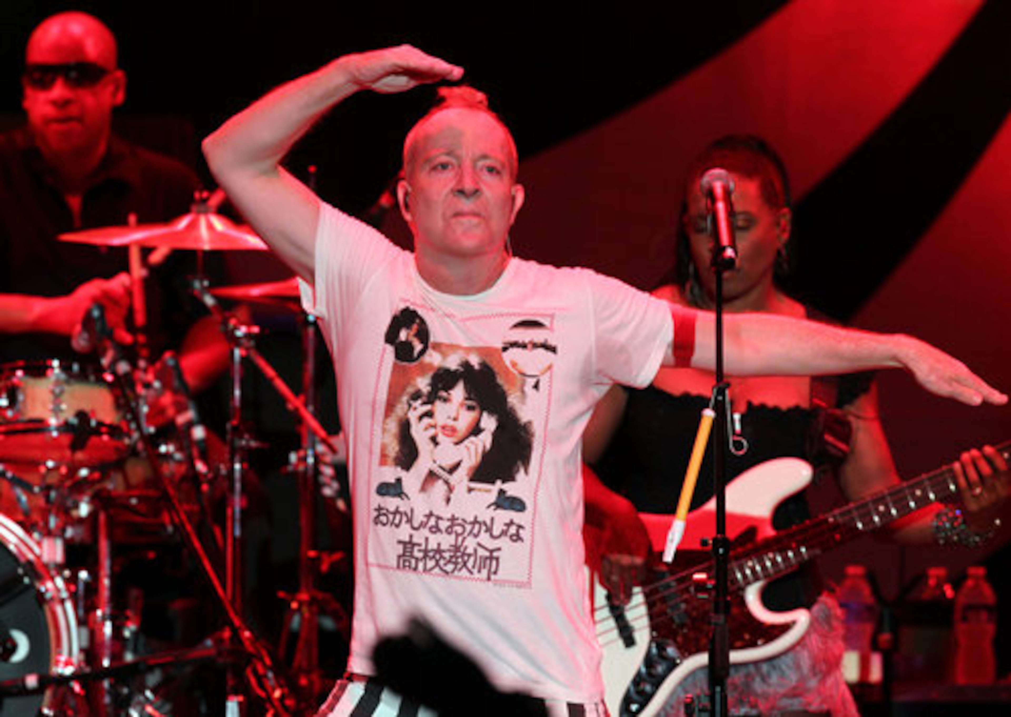 Fred Schneider from the B-52s performs.