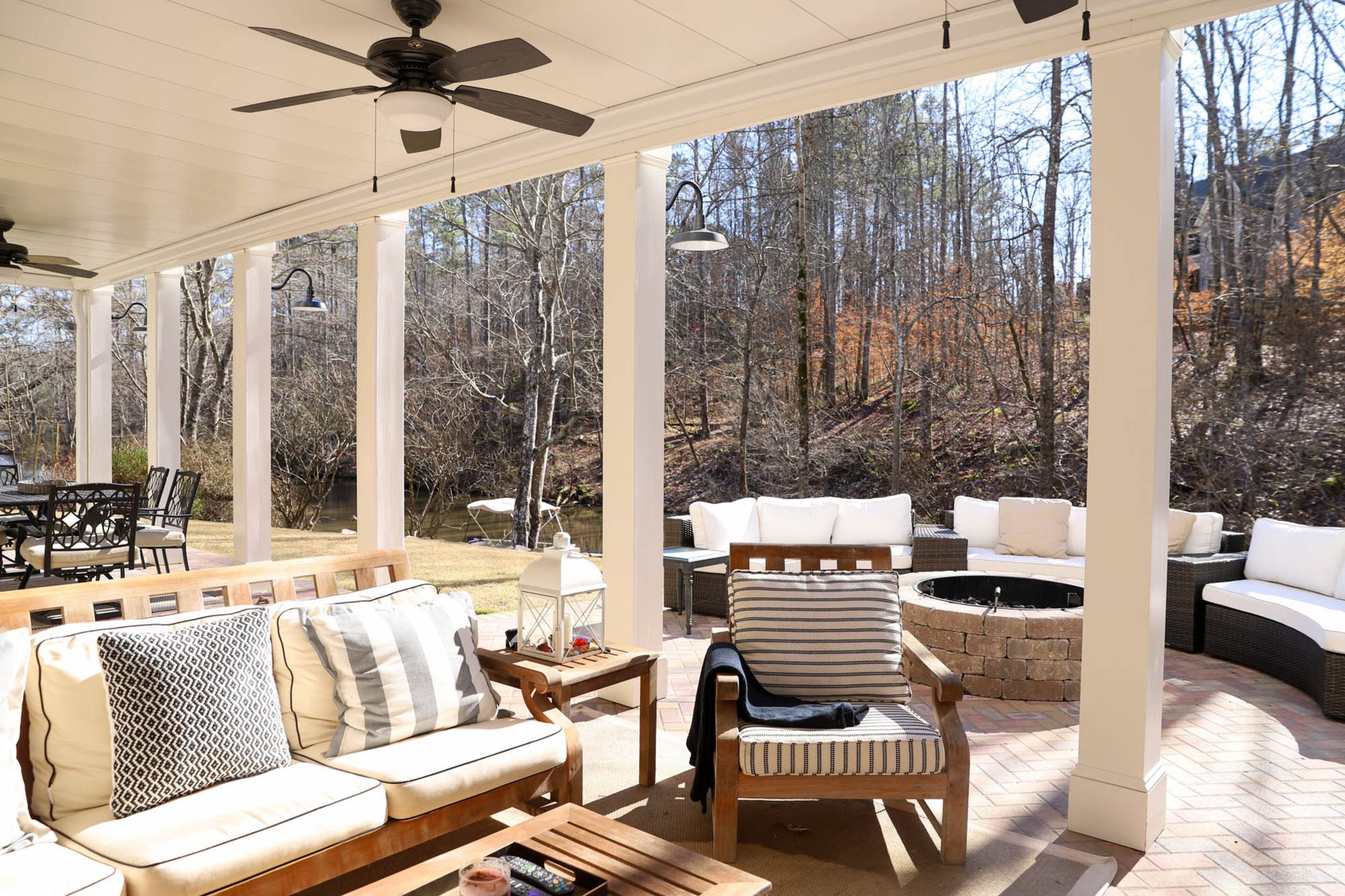 Bob and Ali Van Dillen knew when they moved into their home that they’d want to create an outdoor living space so that they could enjoy the fact that their home backed up to a lake. They put in a fire pit and furniture from Frontgate and AuthenTEAK Outdoor Living to create a space where they could gather and enjoy the outdoors. Text by Shannon Dominy. Photo by Reynolds Rogers.