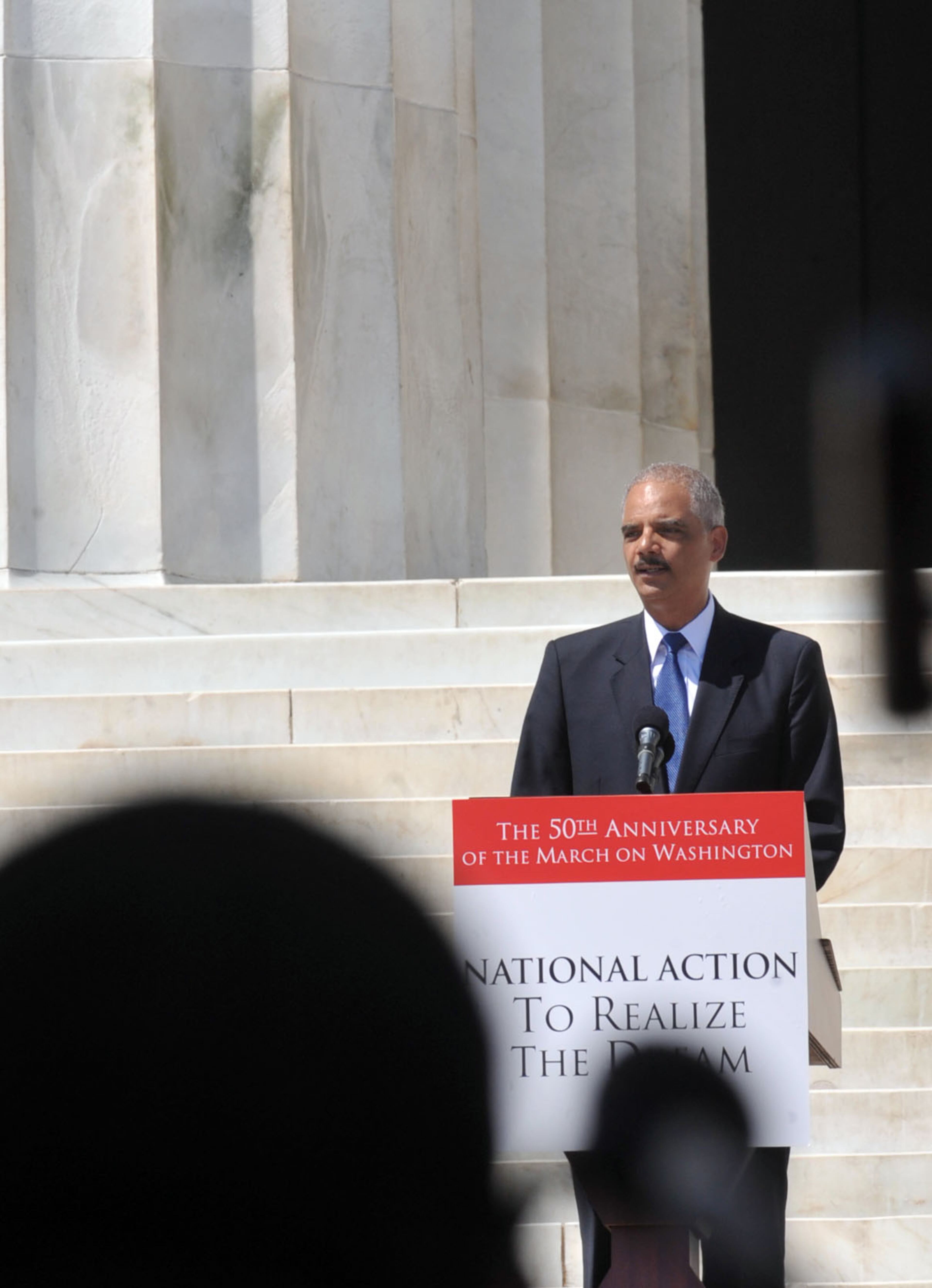 U.S. Attorney General Eric Holder speaks on the 50th Anniversary of the March on Washington in front of the Lincoln Memorial, Saturday August 24, 2013. KENT D. JOHNSON / KDJOHNSON@AJC.COM