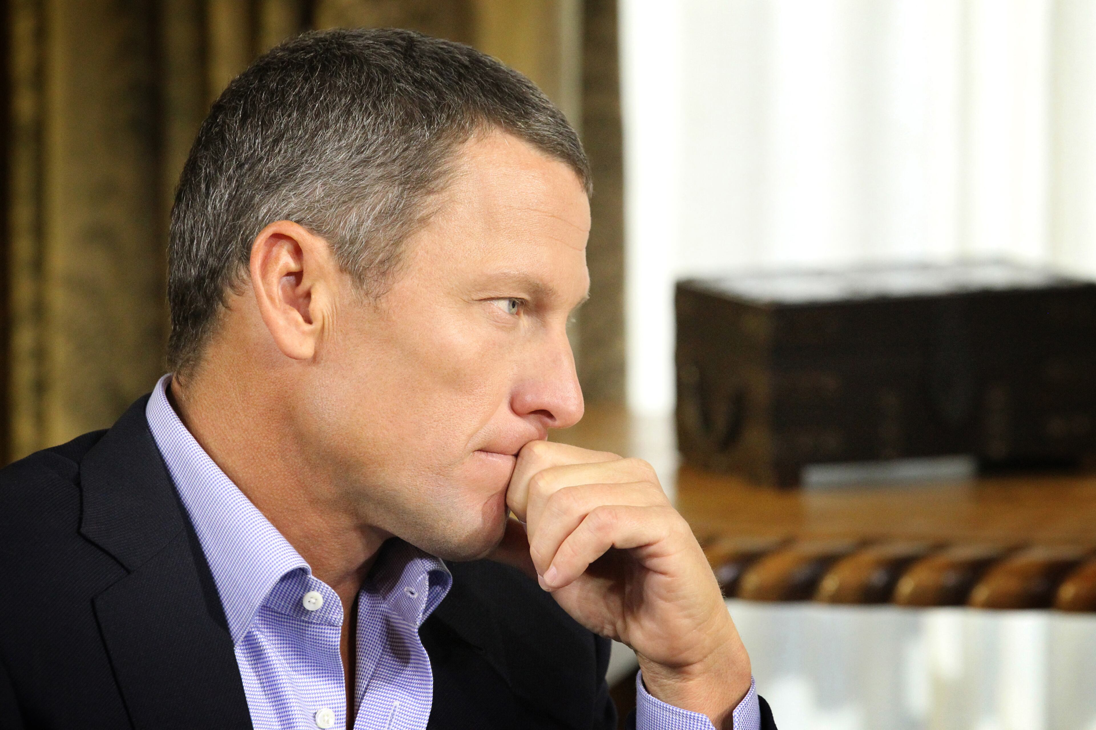 Cyclist Lance Armstrong apologized during an interview with Oprah Winfrey after admitting he lied about years of doping.
