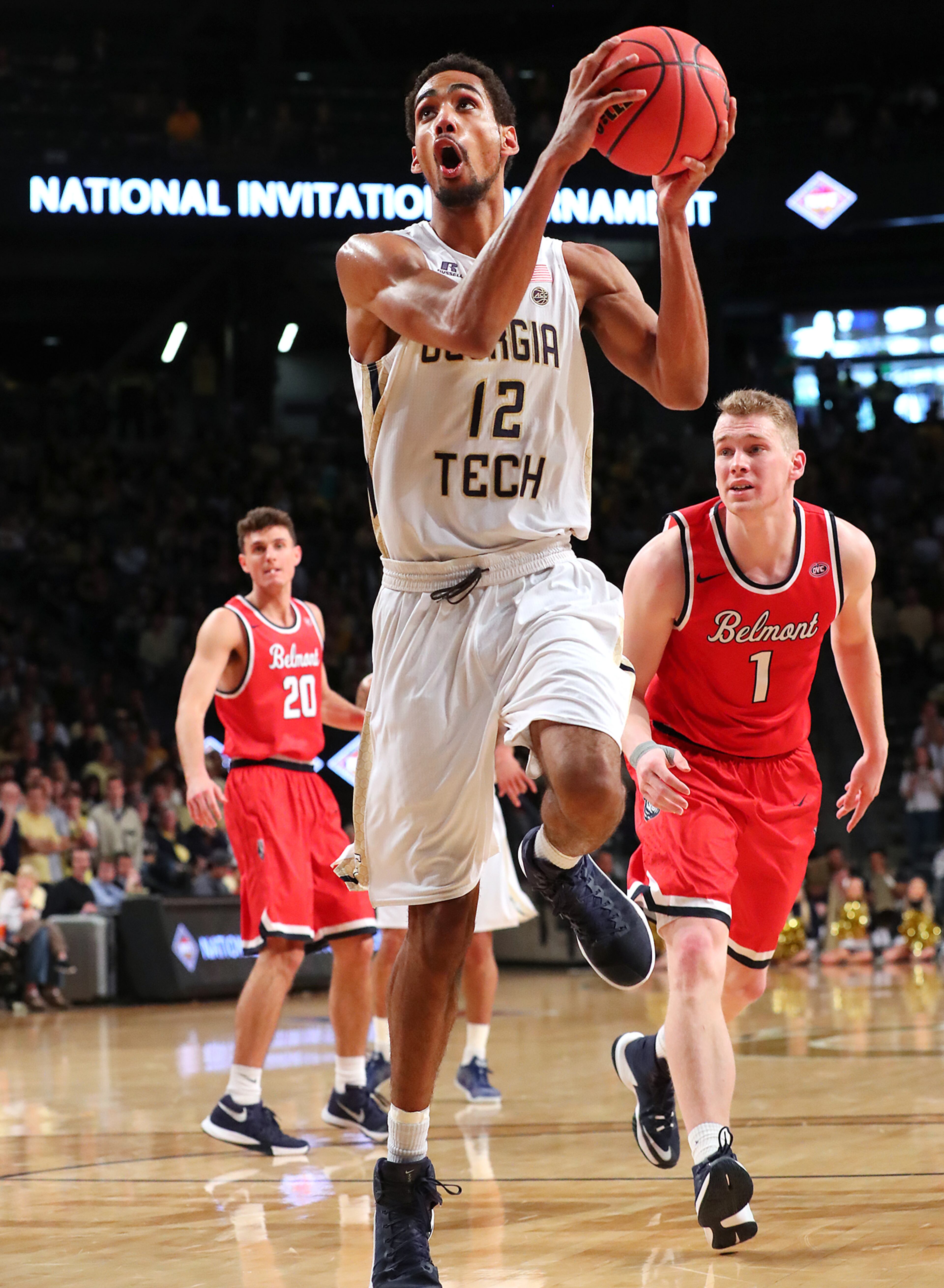 Quinton Stephens, who scored a career-high 23 points, drives to the basket past Belmont defenders Taylor Barnette (left) and Austin Luke during Sunday's game.