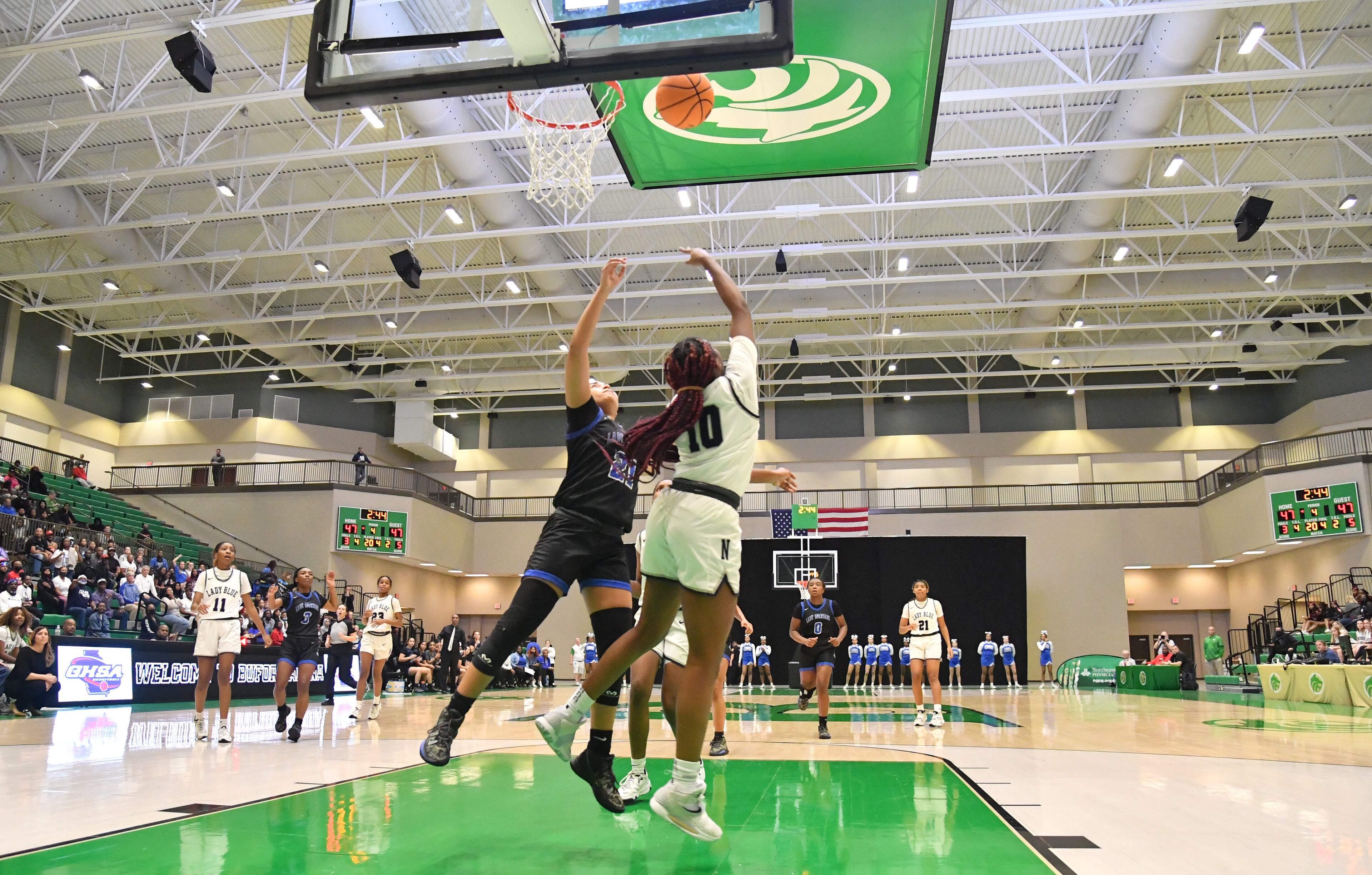 Norcross's Kayla Lindsey (10) shoots over Campbell's Laila Battle (21) in the second half of 2022 GHSA Basketball Playoffs at Buford Arena on Friday, March 4, 2022. Norcross won 54-51 over Campbell. (Hyosub Shin / Hyosub.Shin@ajc.com)
