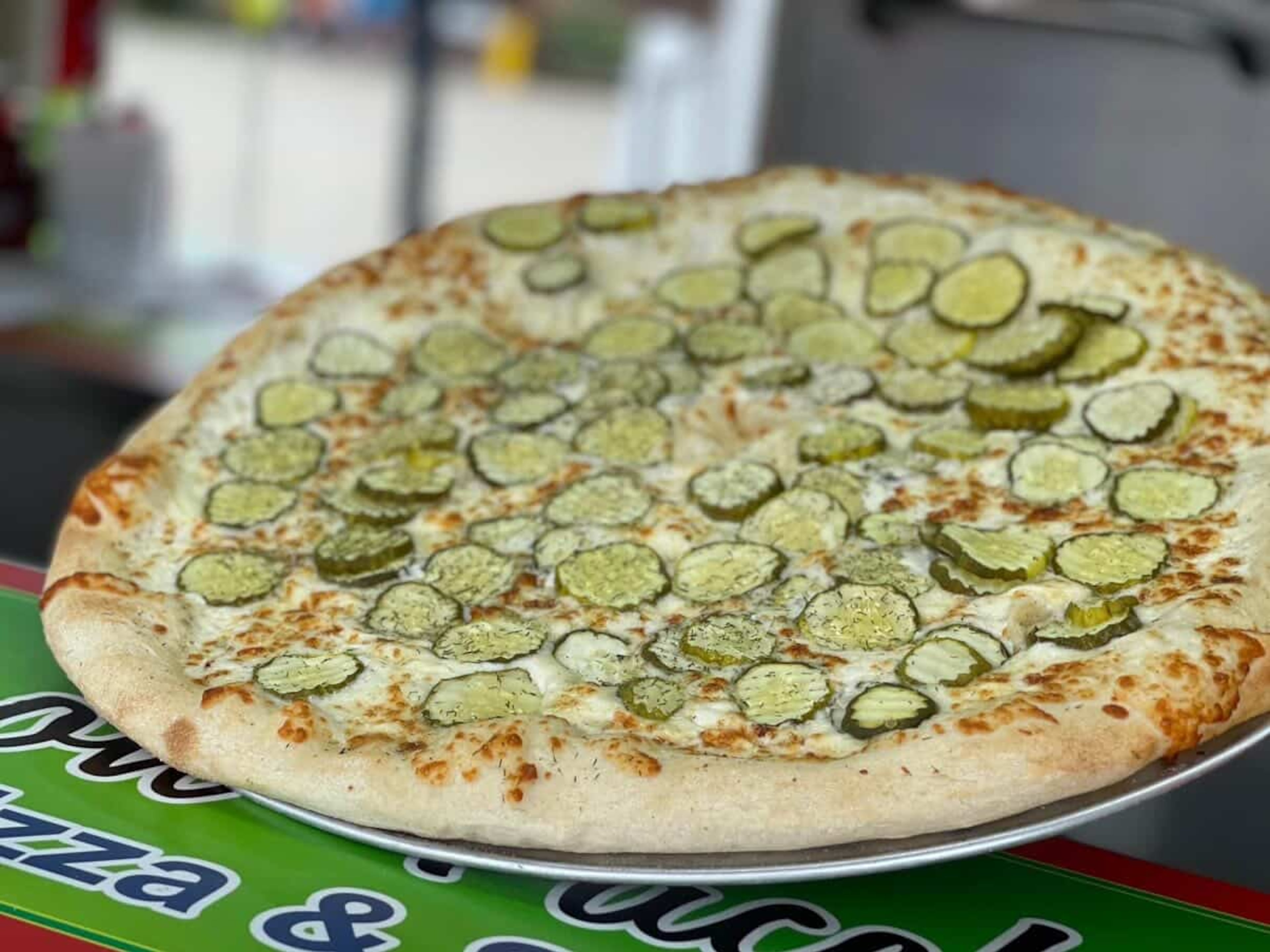 Gillette's Pizza and Lemonade at the Georgia National Fair offer a popular pickle-topped pizza. (Courtesy of Gillette's Pizza and Lemonade)