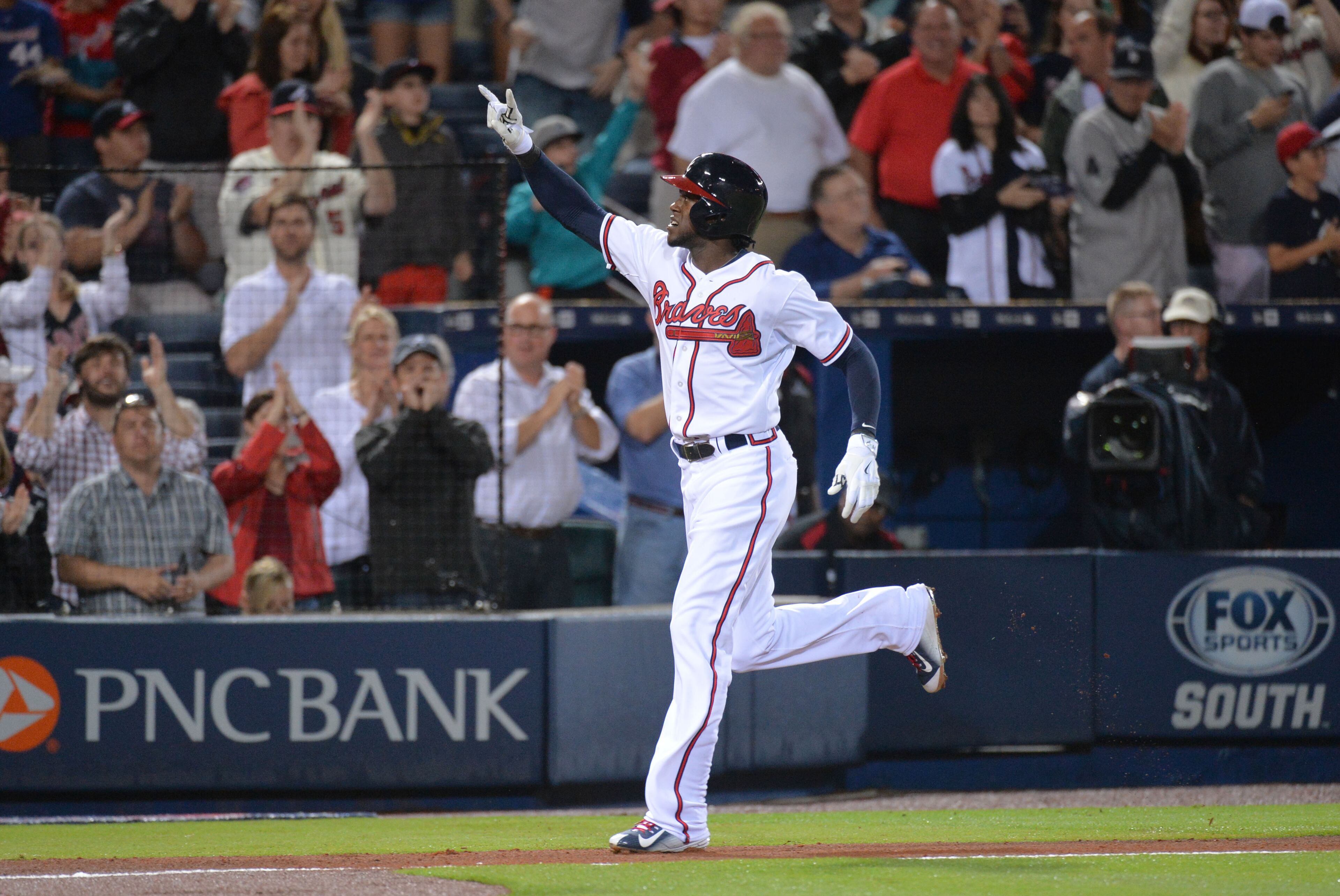 April 10, 2015 Atlanta - Atlanta Braves center fielder Cameron Maybin (25) celebrates after he hit a solo homer in the first inning at Turner Field in Atlanta on Friday, April 10, 2015. HYOSUB SHIN / HSHIN@AJC.COM