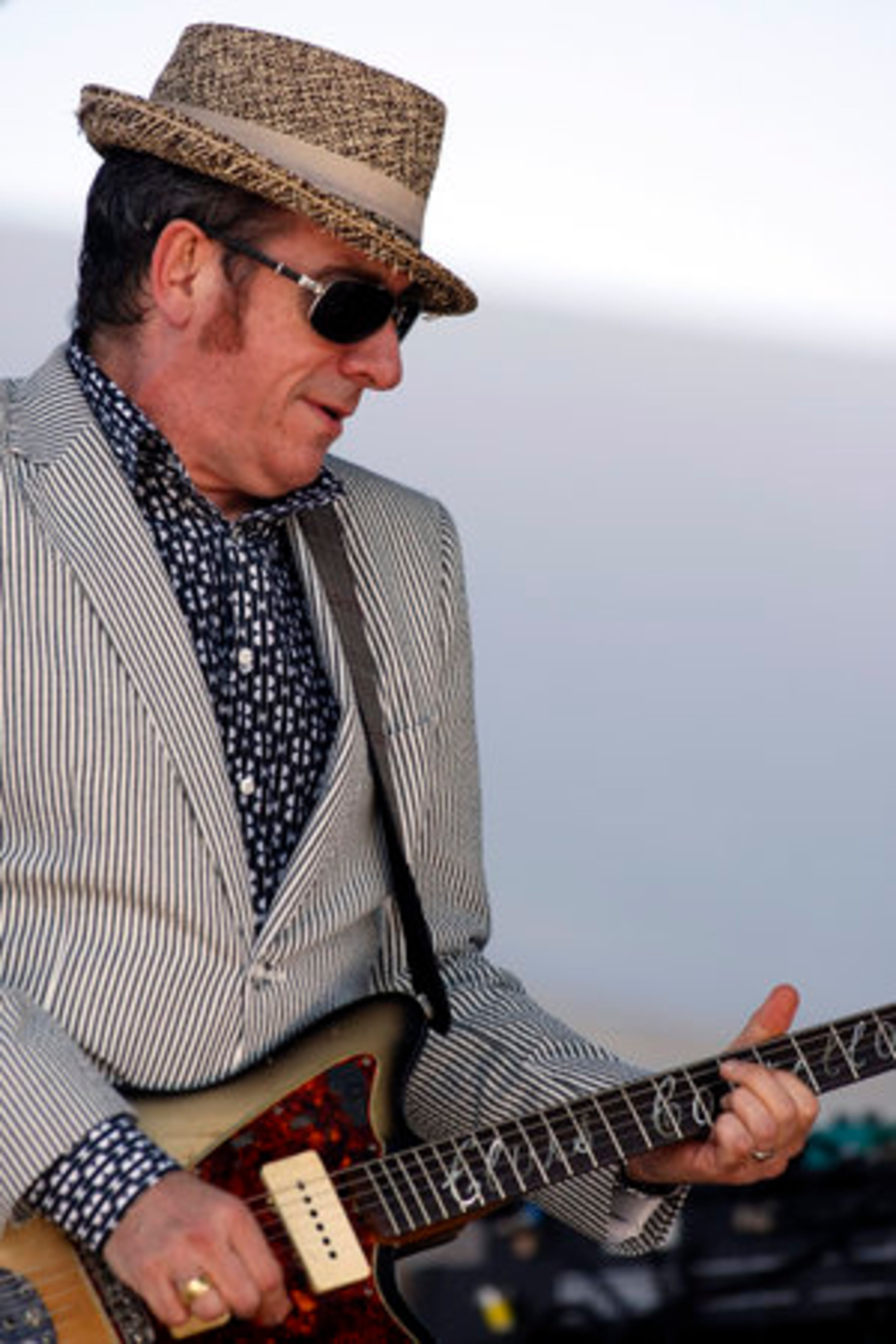 Elvis Costello rocked the guitar -- and a stylish hat.