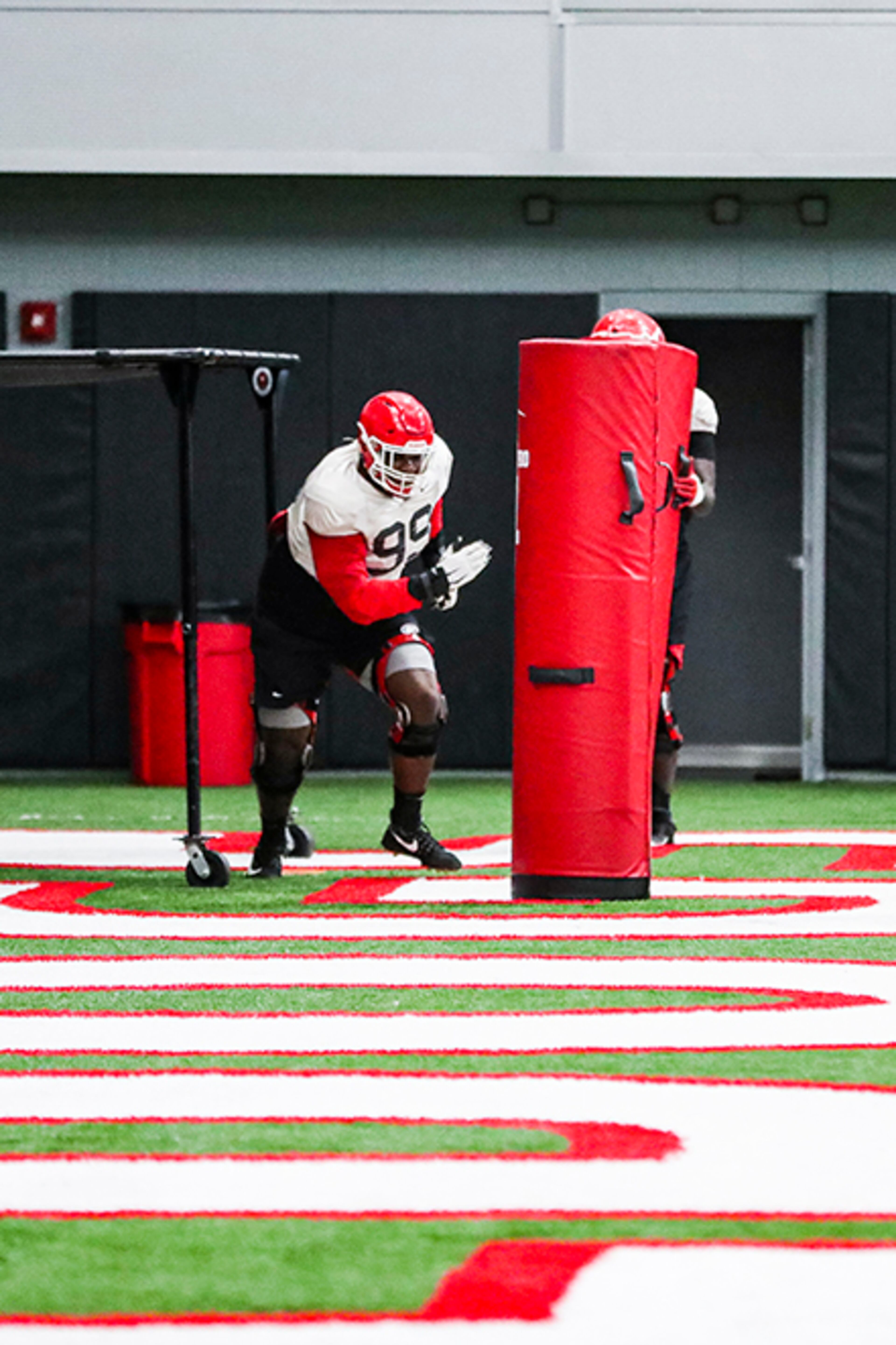 Georgia defensive lineman Jordan Davis (99) runs through a drill during the Bulldogs’ practice session ahead of the Chick-fil-A Peach Bowl Bowl Tuesday, Dec. 29, 2020, in Athens. (Chamberlain Smith/UGA Sports)