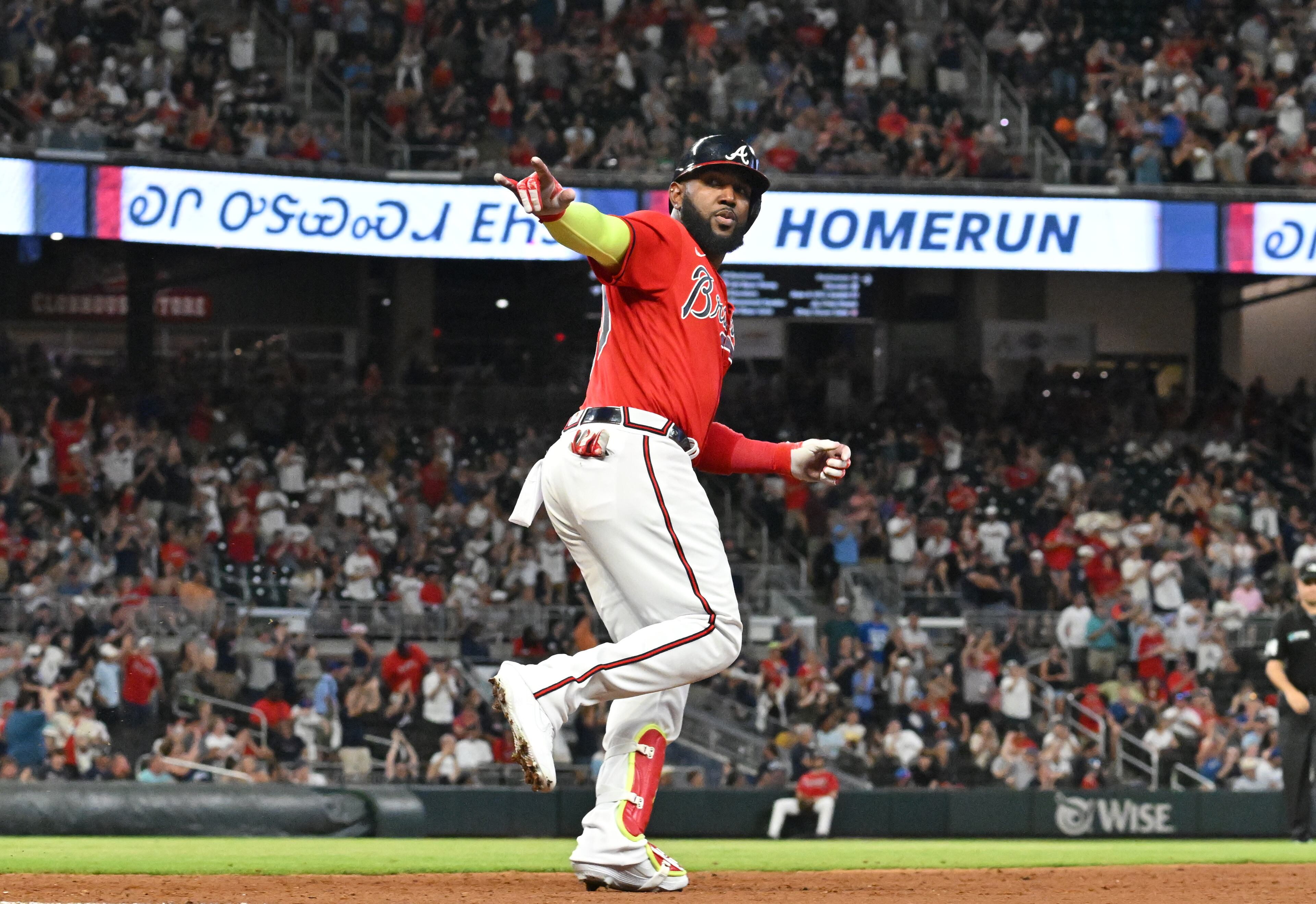 Atlanta Braves' designated hitter Marcell Ozuna (20) hits a solo home run in the 8th inning at Truist Park on Friday, July 22, 2022. Atlanta Braves won 8-1 over Los Angeles Angels. (Hyosub Shin / Hyosub.Shin@ajc.com)