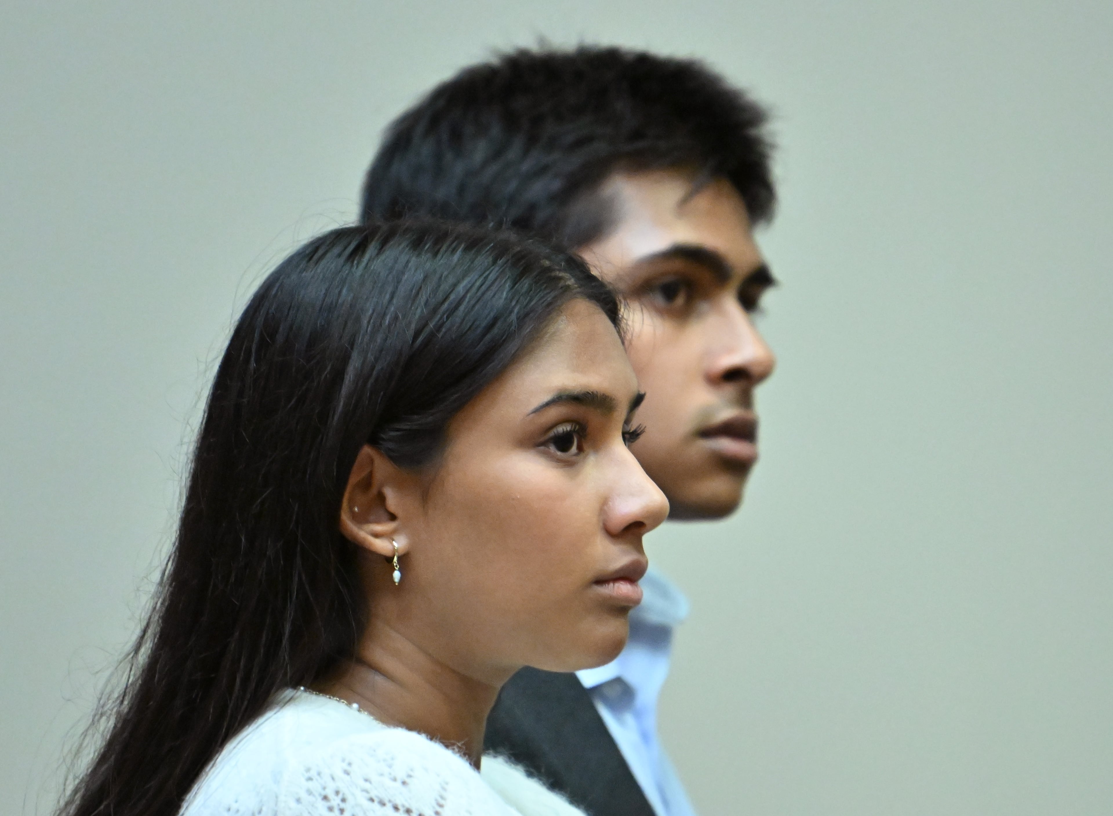 Ananya Rao (foreground) and Nitin Rao, children of Sumanth and Anindita Rao, appear during a hearing at DeKalb County Courthouse in April 2026. Ananya was injured in the 2024 car crash. (Hyosub Shin/AJC)