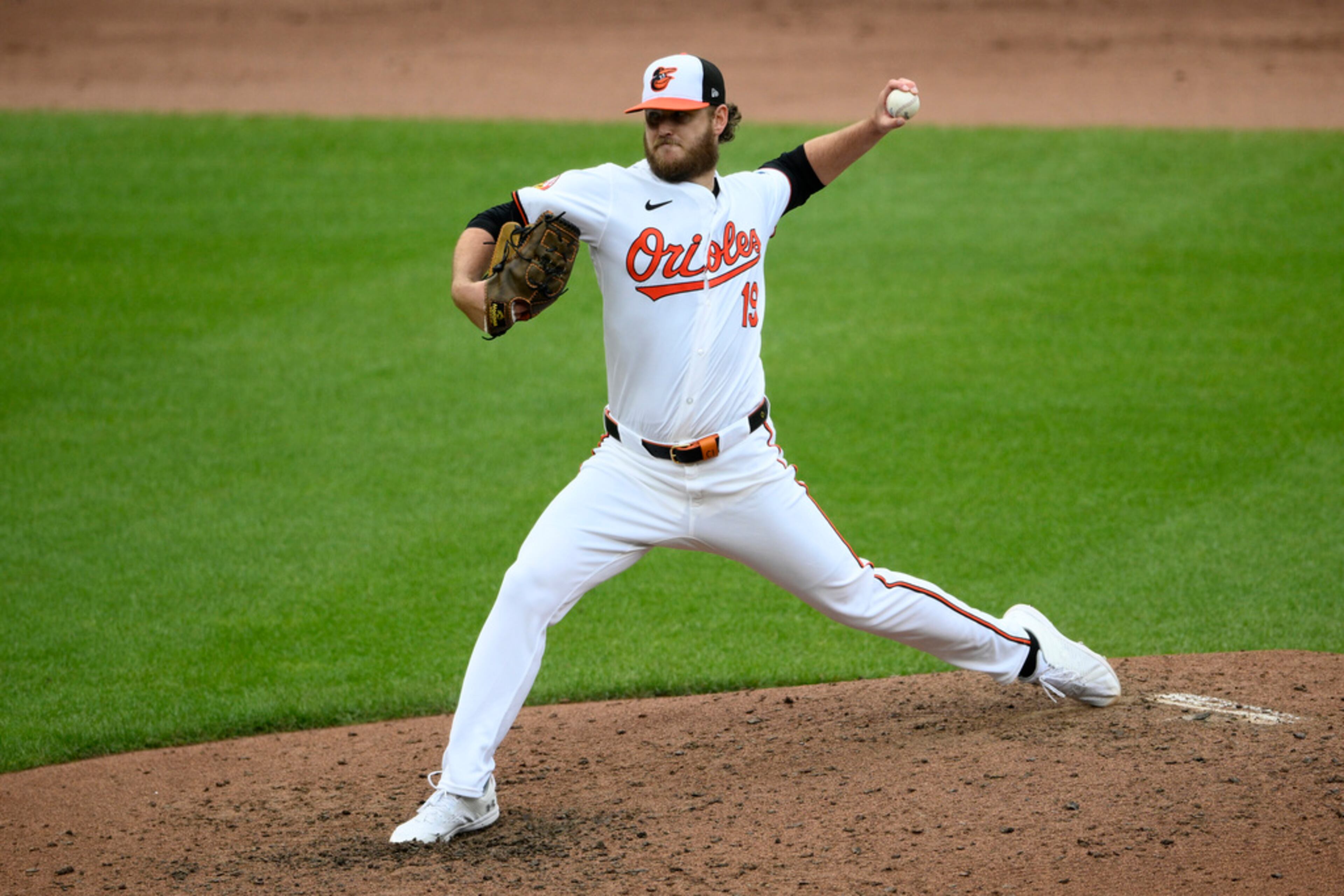 Baltimore Orioles starting pitcher Cole Irvin throws during the fifth inning of a baseball game against the Atlanta Braves, Thursday, June 13, 2024, in Baltimore. (AP Photo/Nick Wass)