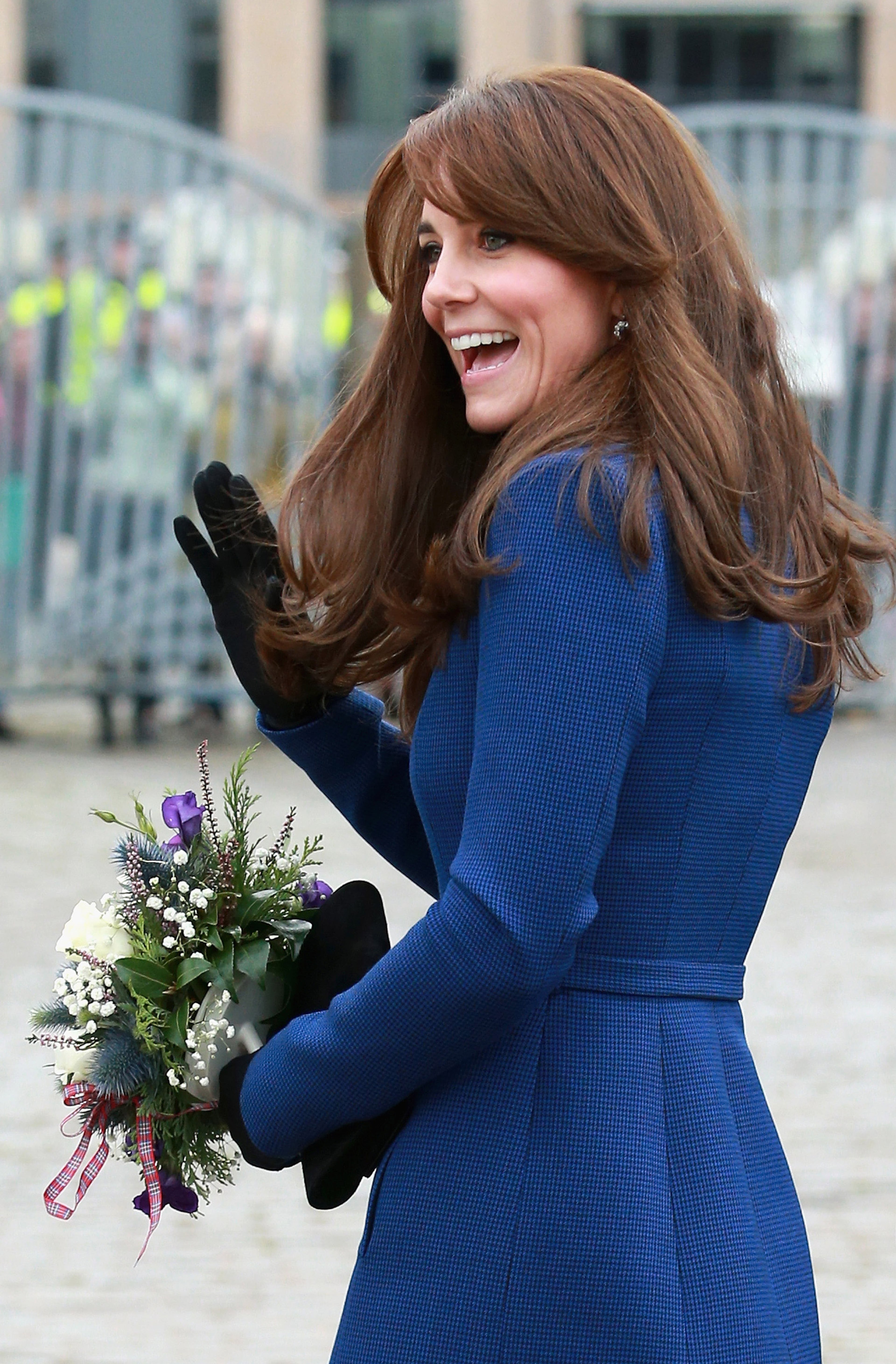 DUNDEE, SCOTLAND - OCTOBER 23: Children wave Union Jacks as Catherine, Duchess of Cambridge arrives at RSS Discovery as part of an away day to the Scottish City on October 23, 2015 in Dundee, Scotland. (Photo by Chris Jackson/Getty Images)