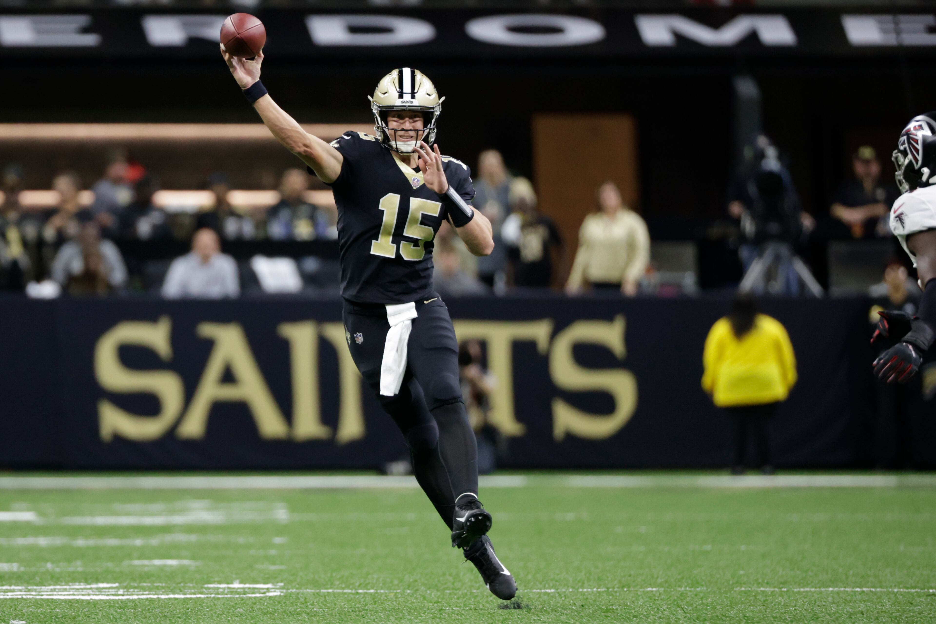 New Orleans Saints quarterback Trevor Siemian (15) throws the ball against the Atlanta Falcons during the first half of an NFL football game, Sunday, Nov. 7, 2021, in New Orleans. (AP Photo/Derick Hingle)