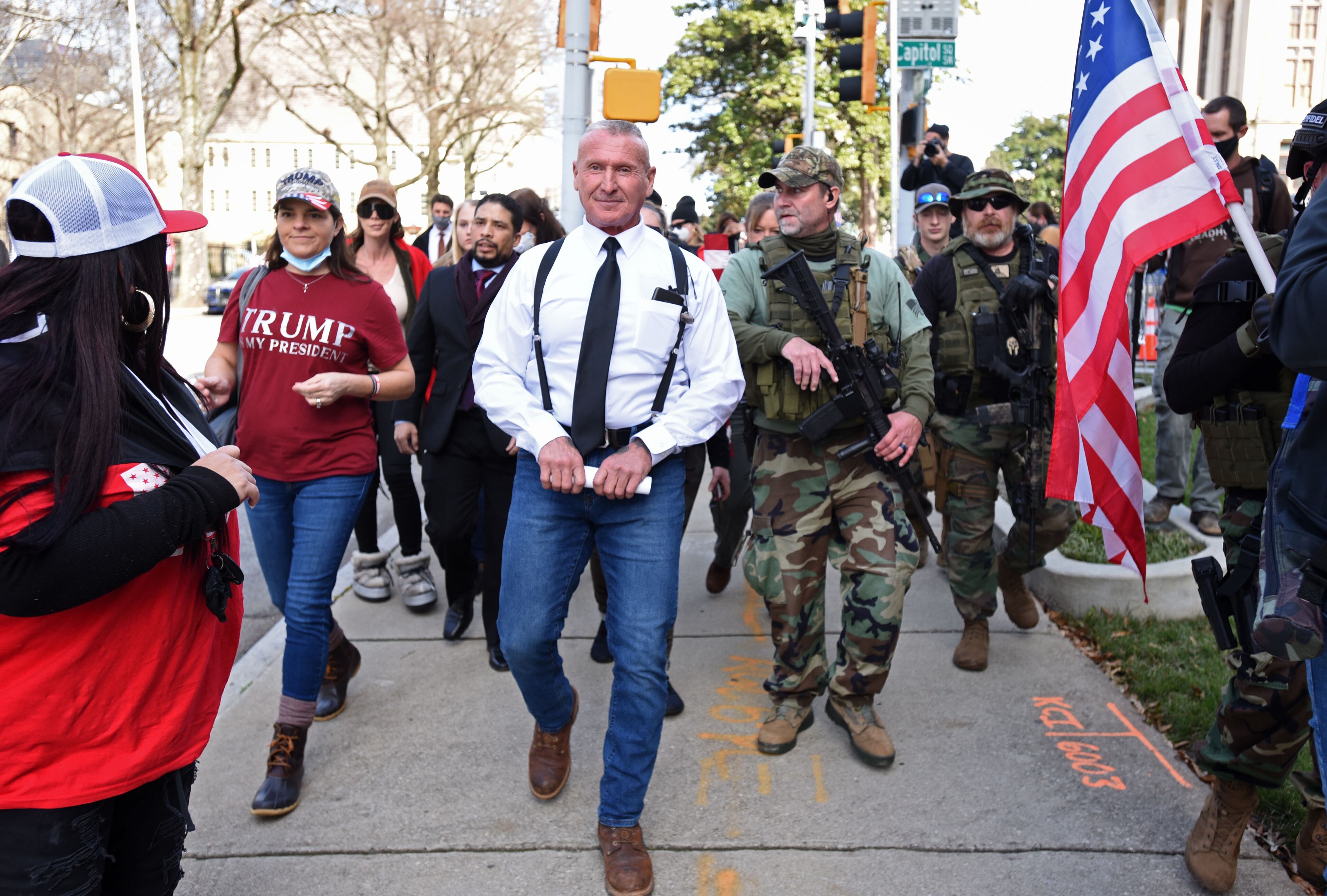 January 6, 20201 Atlanta - Former Ku Klux Klan leader and current American Patriots USA leader Chester Doles (center), holding a letter, leads a group of protesters before he delivers the letter inside the Georgia State Capitol during Stop the Still rally organized by American Patriots USA outside the Georgia State Capitol on Wednesday, January 6, 2021. (Hyosub Shin / Hyosub.Shin@ajc.com)