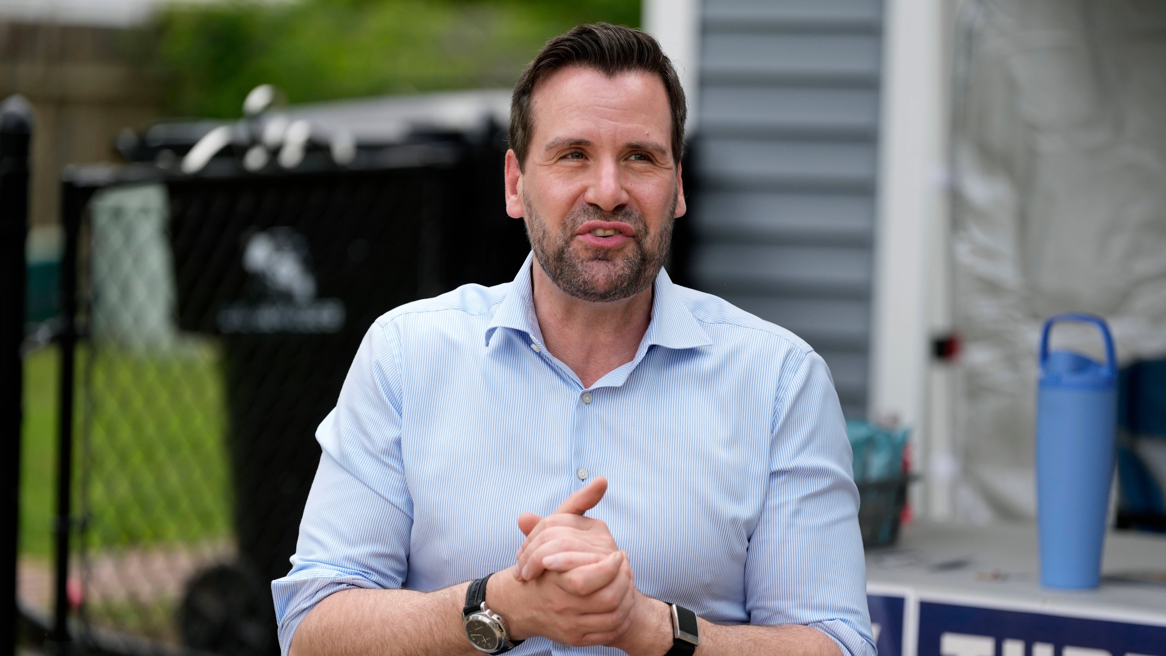 Iowa state Rep. Josh Turek, a Democratic candidate for U.S. Senate, speaks to supporters before a canvassing event, Sunday, May 31, 2026, in Waukee, Iowa. (AP Photo/Charlie Neibergall)