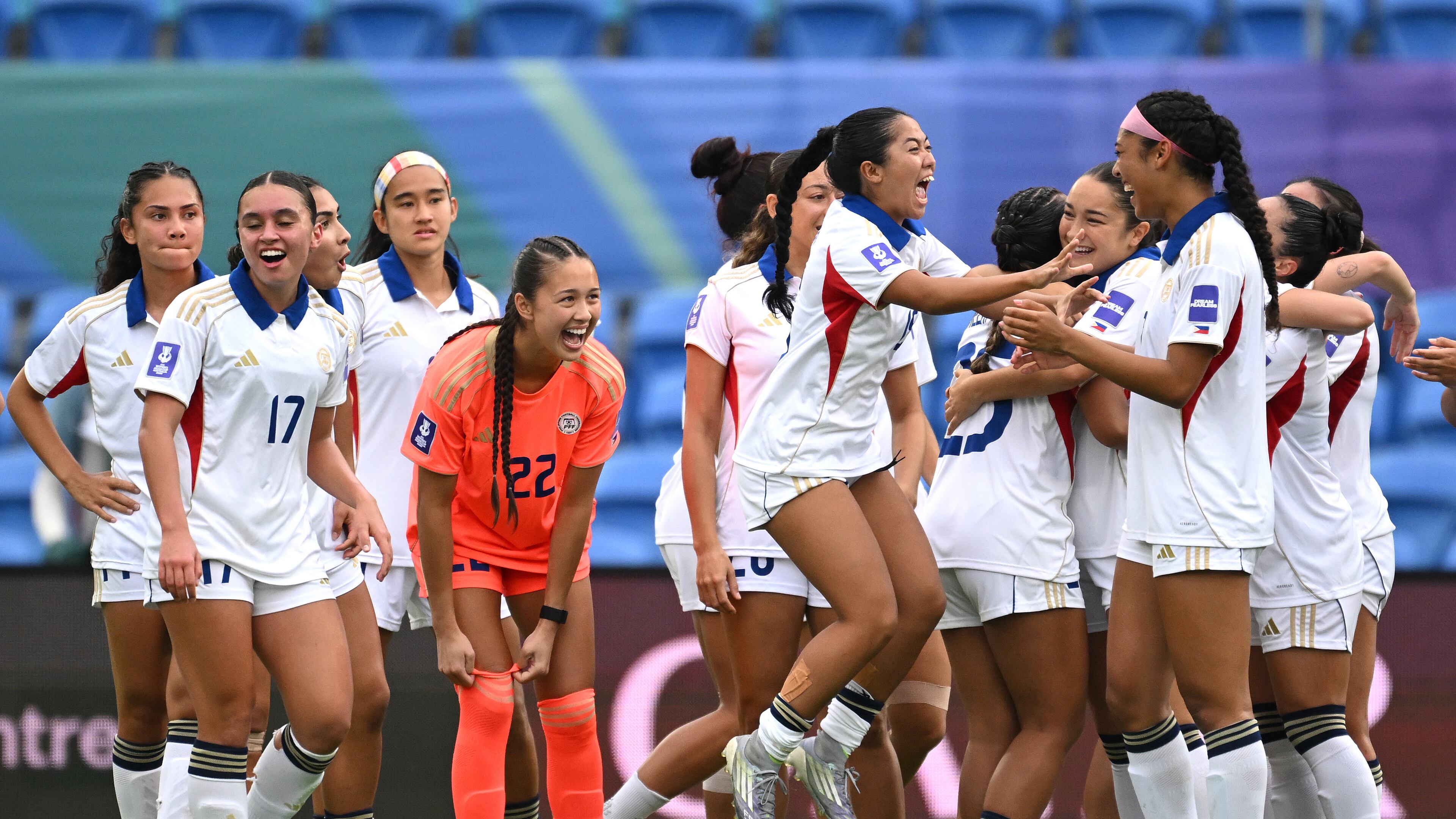 Philippines players celebrate after defeating Uzbekistan in Women's Asian Cup qualifying match for the World Cup, at Gold Coast Stadium In Robina, Australia, Thursday, March 19, 2026. (Dave Hunt/AAP Image via AP)