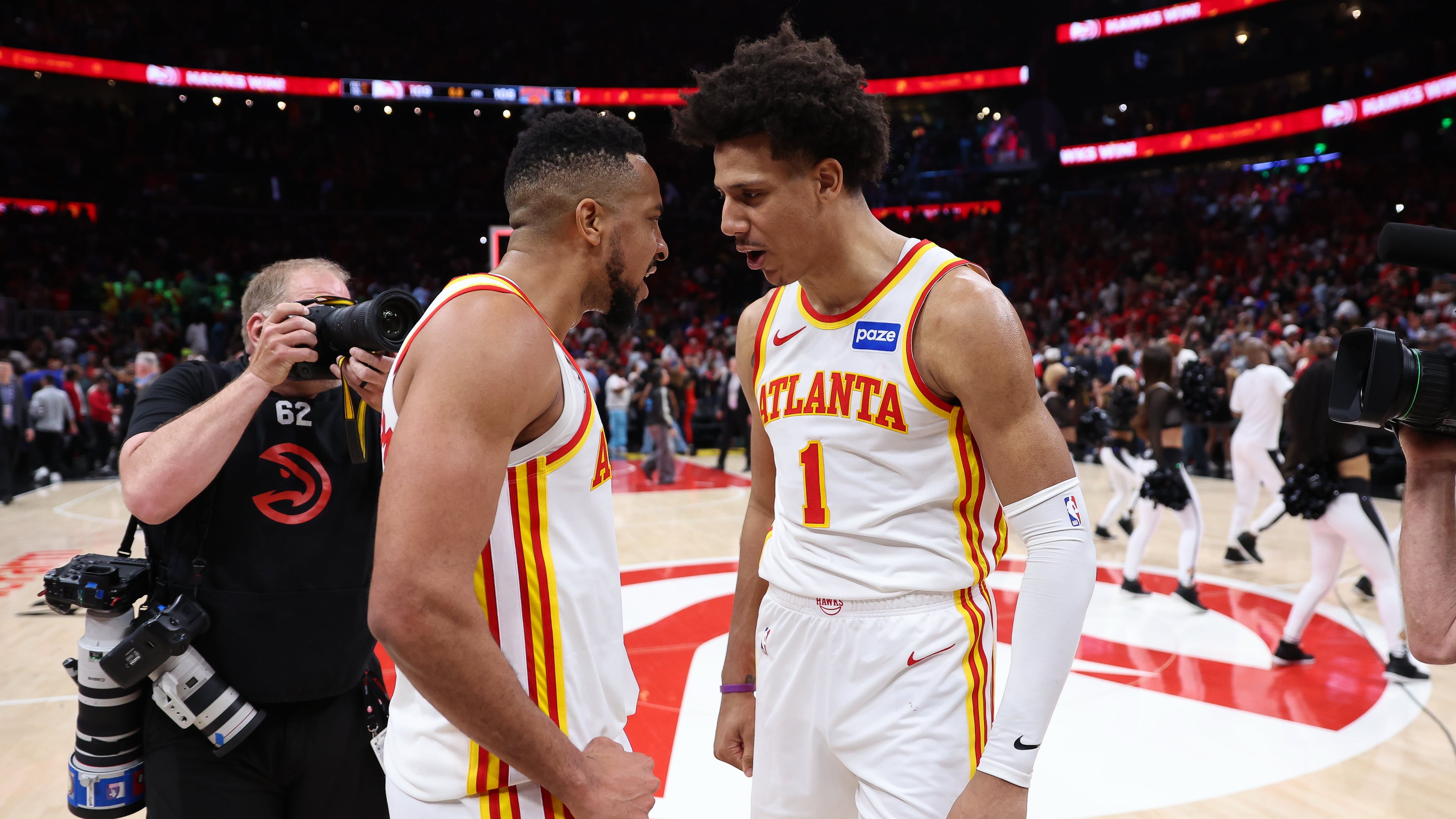 Atlanta Hawks guard CJ McCollum, left, and forward Jalen Johnson, right, react after Game 3 of a first-round NBA playoffs basketball series against the New York Knicks, Thursday, April 23, 2026, in Atlanta. (AP Photo/Colin Hubbard)