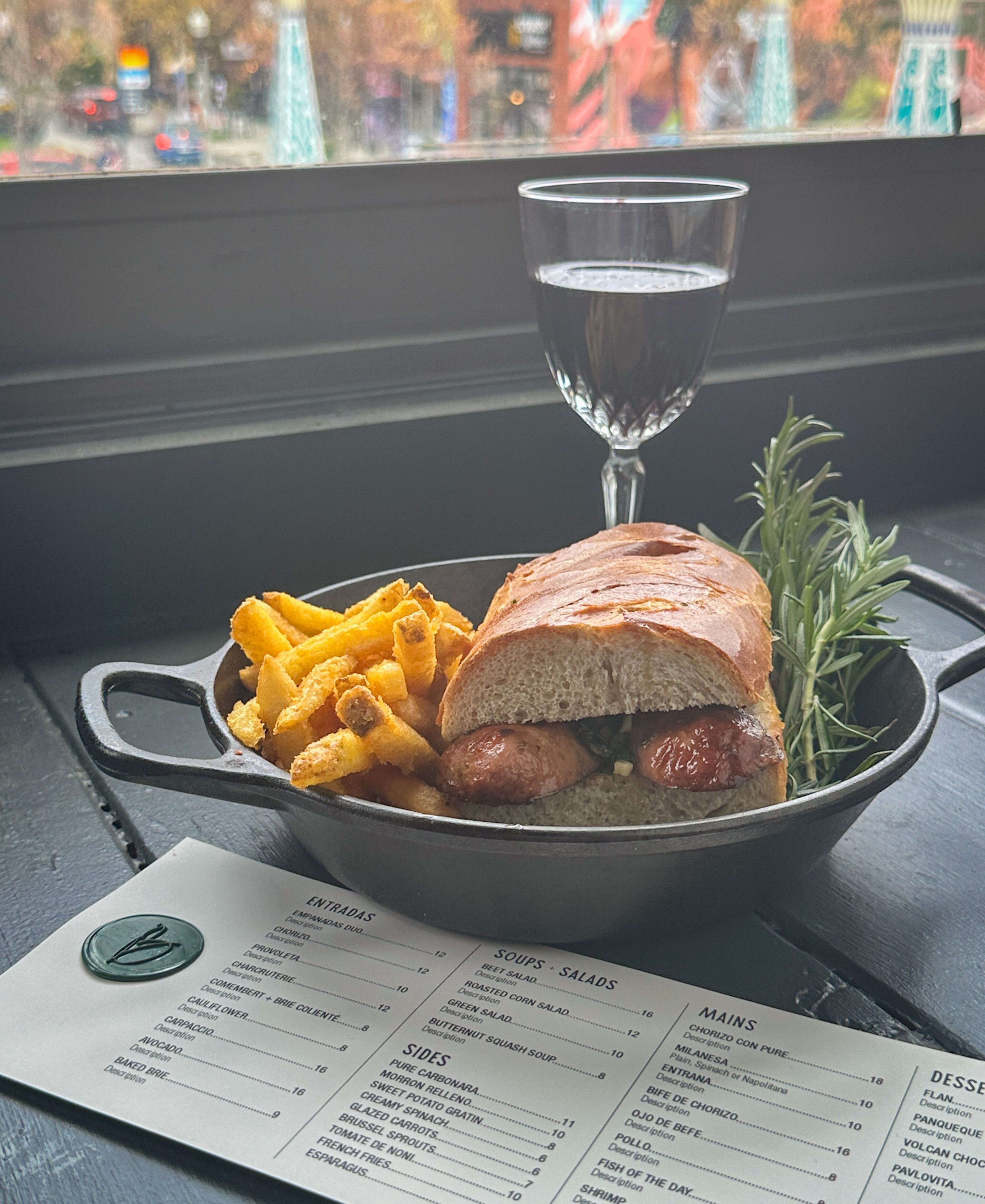 Choripan is a traditional Argentine sandwich made with chorizo sausage on a baguette. At Belen Bistro, the sandwich gets a boost from fresh chimichurri. (Courtesy of Belen Bistro & Market)