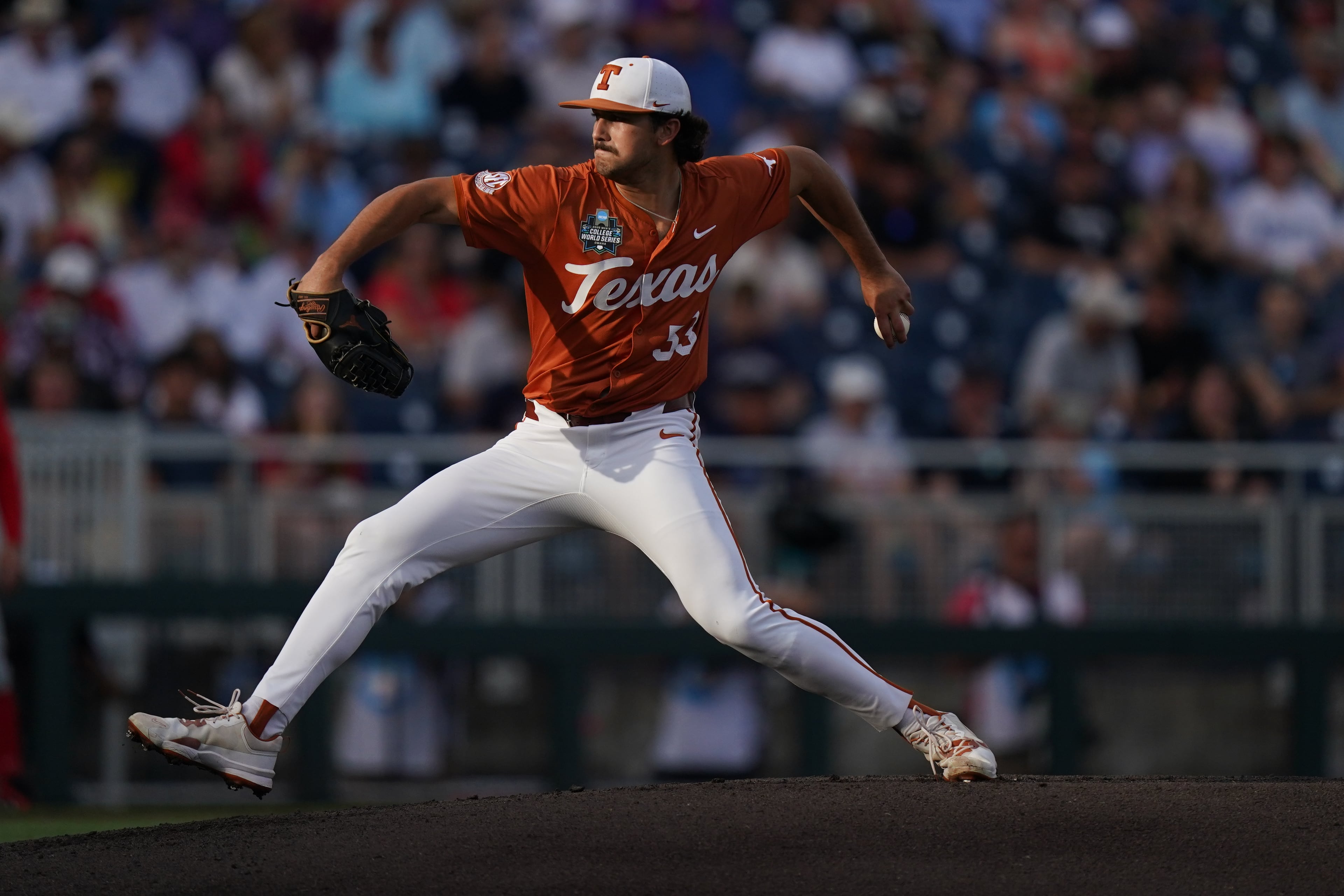 Texas pitcher Luke Harrison (53) throws off the mound during an NCAA baseball College World Series elimination game against Georgia, Tuesday, June 16, 2026 in Omaha, Neb. Georgia won 2-0. (AP Photo/Vera Nieuwenhuis)