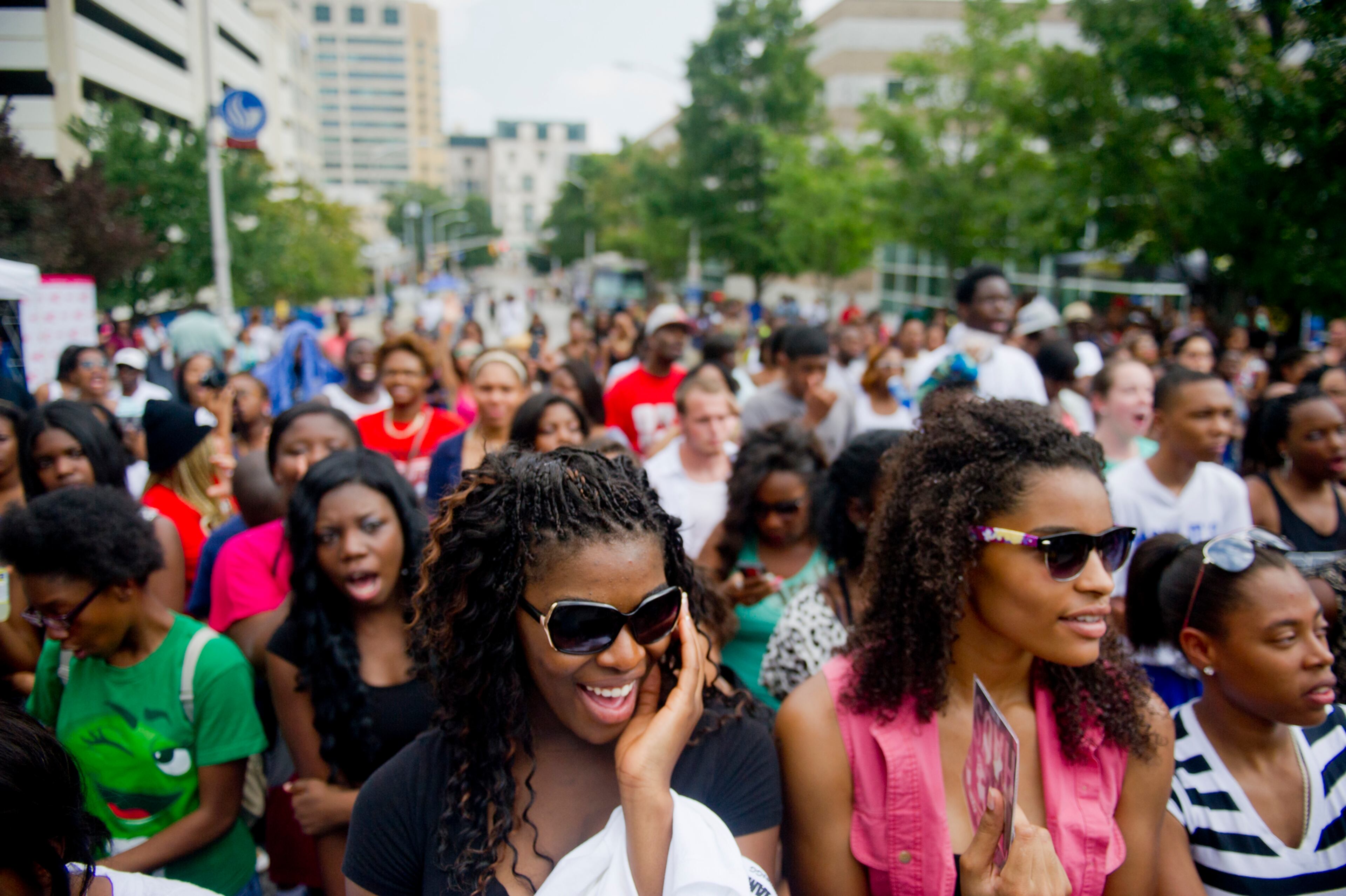 Dorianne Kaboya (left) and Kendra Hill cheer at Georgia State University in Atlanta during the LudaDay Weekend Block Party on Saturday, August 31, 2013. The event featured a full day of performances by local and national artists such as Pastor Troy, Mylah, Mack Wilds and of course Ludacris. JONATHAN PHILLIPS / SPECIAL