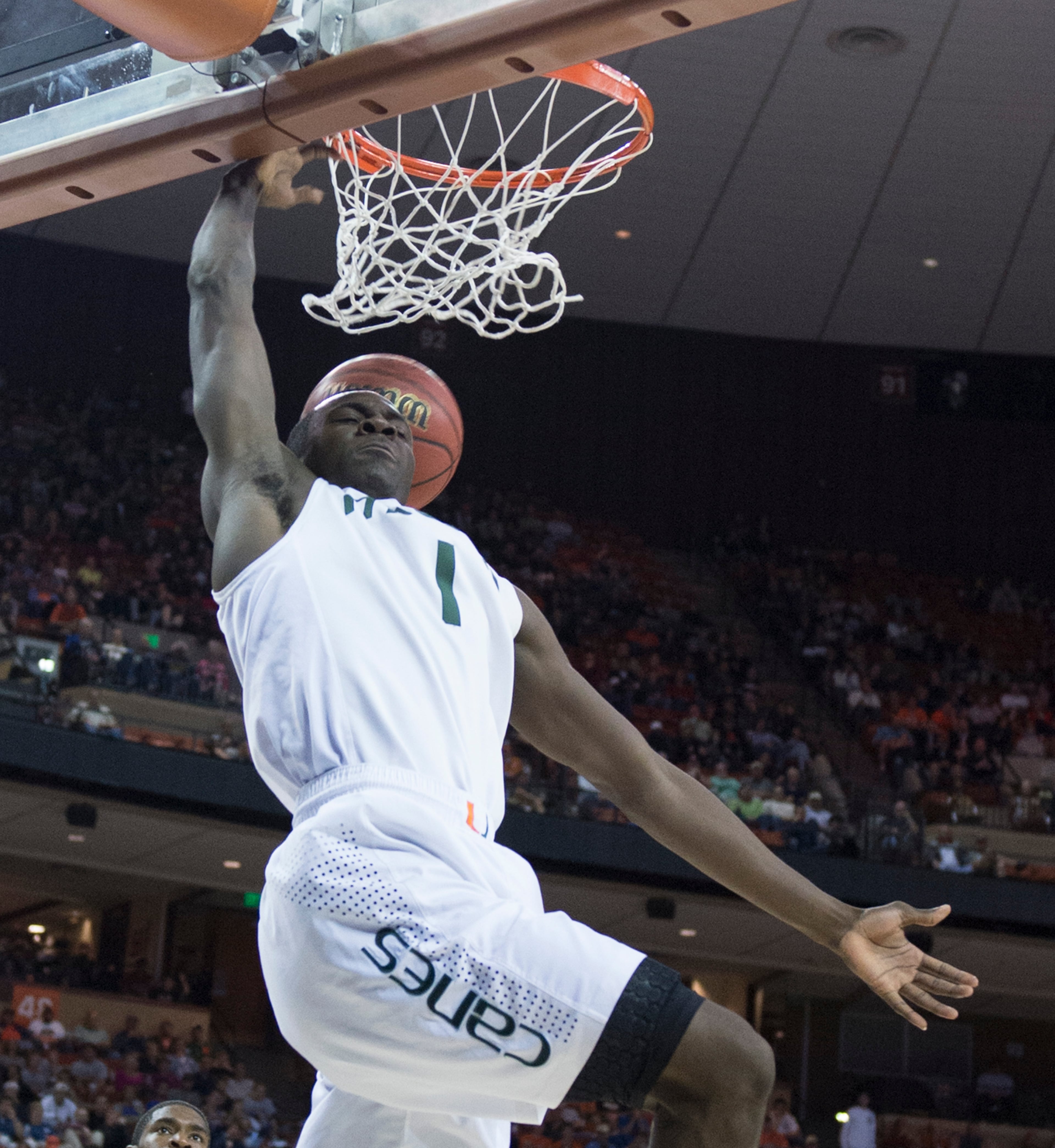 Durand Scott (1) of Miami puts in a dunk against Illinois in the second half of their NCAA Tournament third round game on Sunday, March 24, 2013, in Austin, Texas. (George Bridges/MCT)