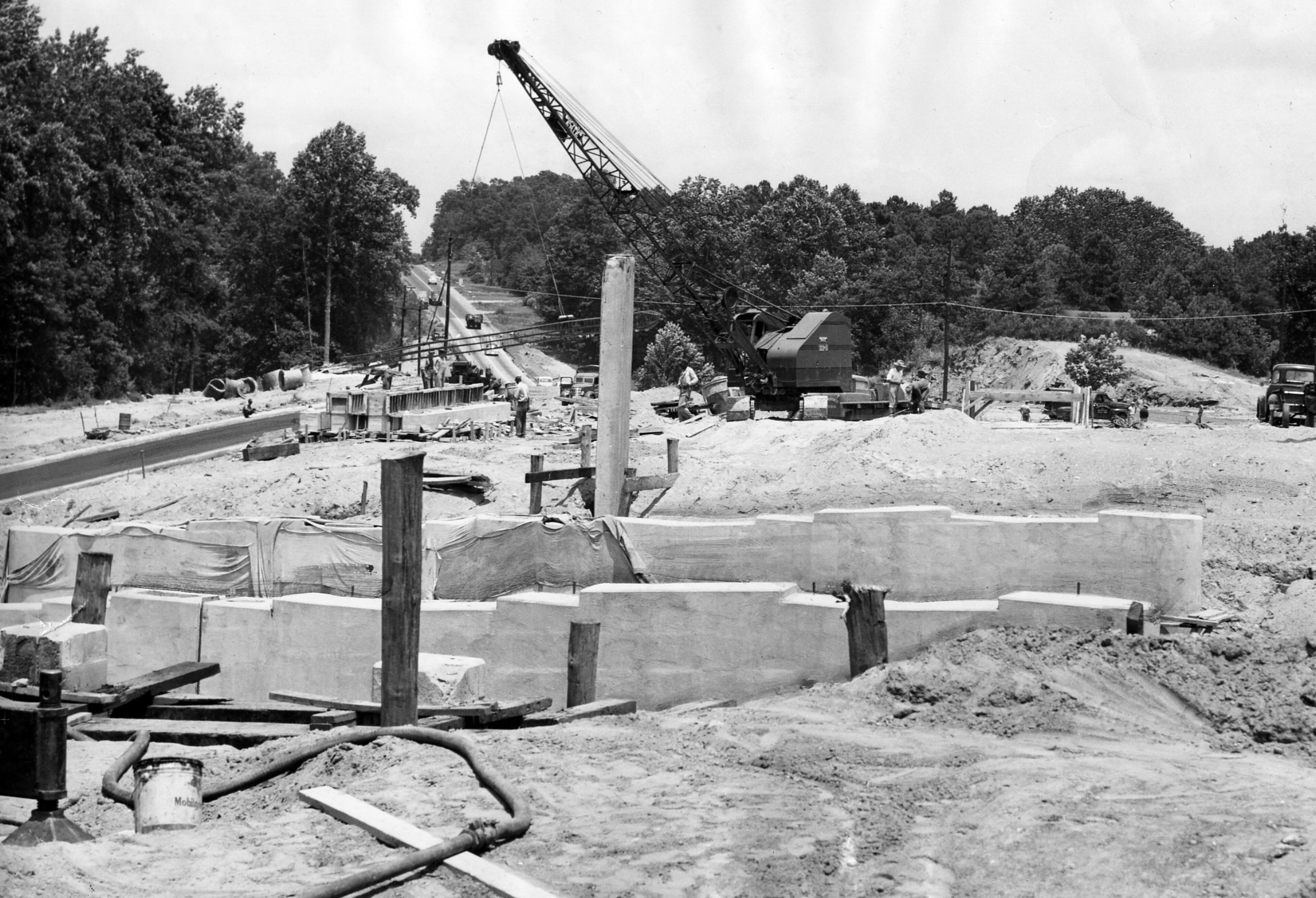 Atlanta, GA - (3rd of 3 photos) -- In the distance is the goal: Buford Highway. Foreground shows Lenox Road Bridge under construction. (Van Toole/AJC staff) 1954
