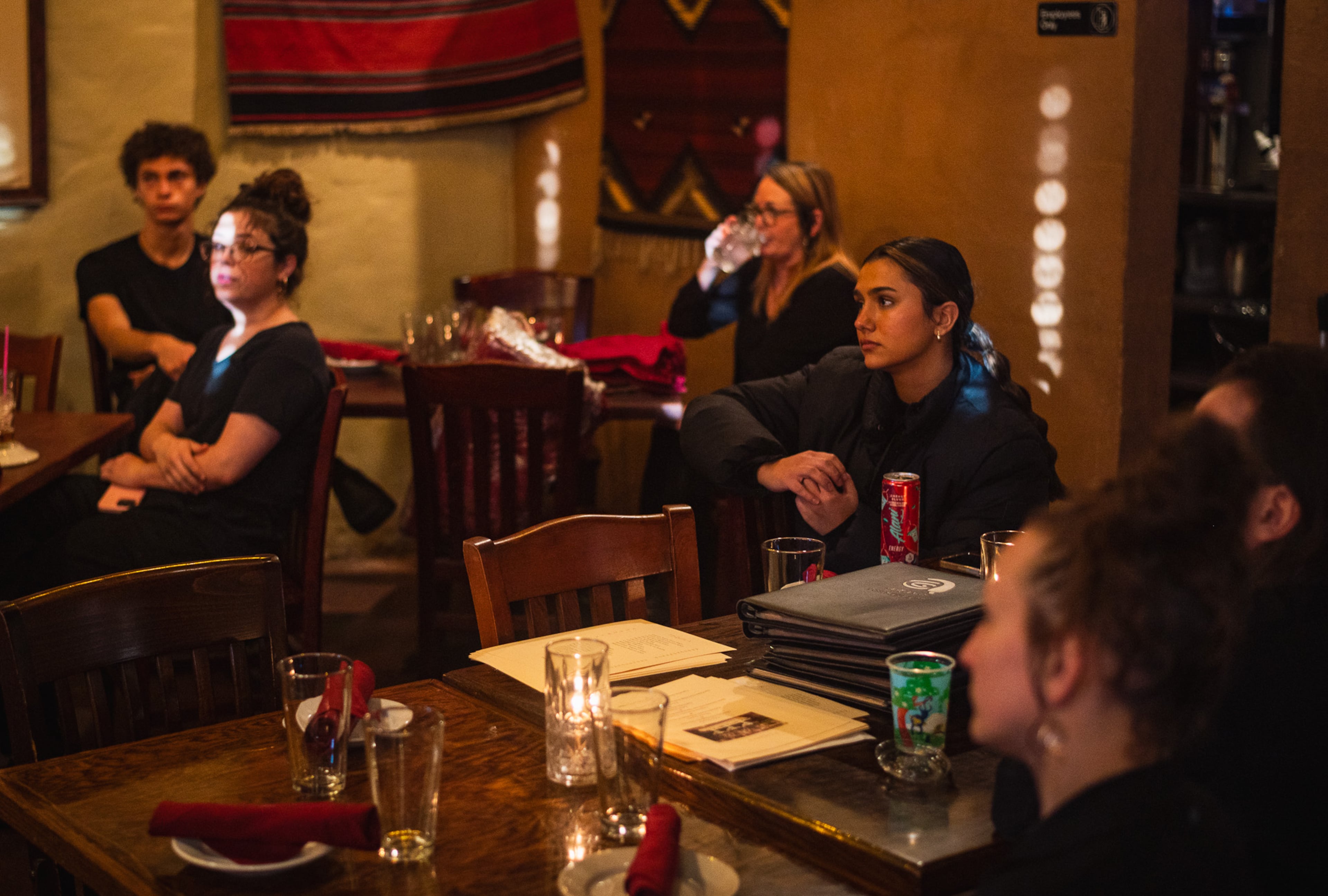 Agave employees intently listen to chef and owner Jack Sobel before service on Thursday, Jan. 15, 2026. In October, the restaurant announced that it would close Jan. 31. (Henri Hollis/AJC)