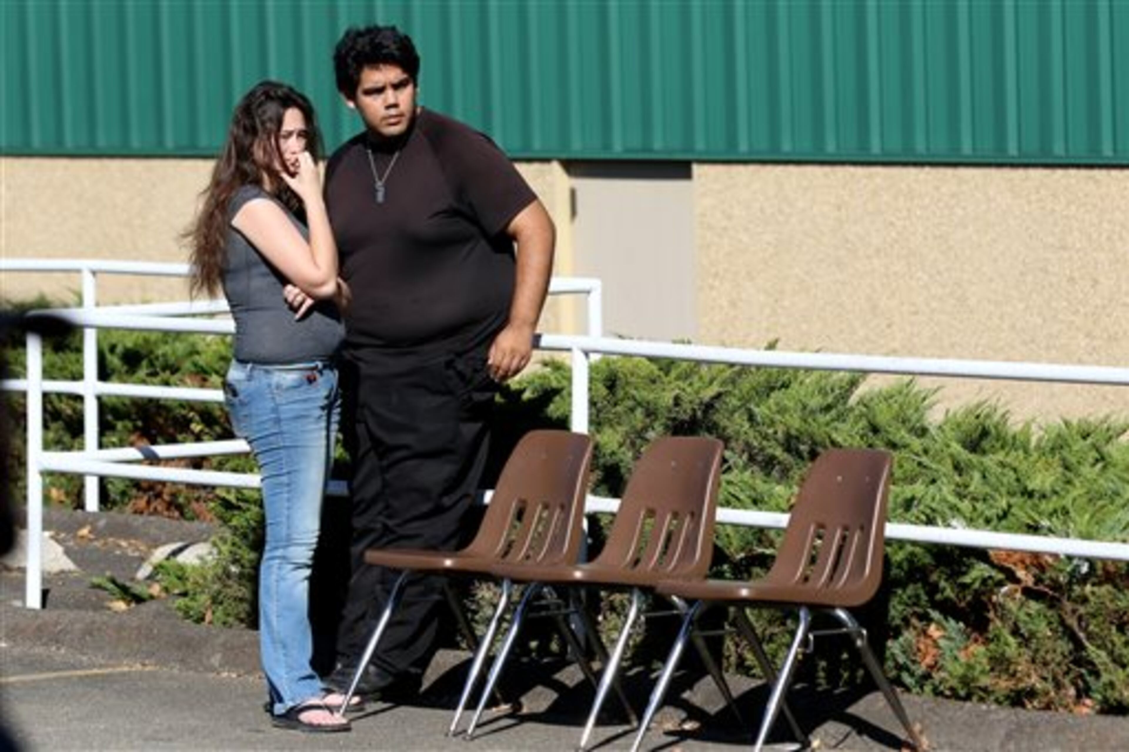 Click on this link for updates on the Oregon school shooting. Friends and family wait for students at the local fairgrounds after a deadly shooting at Umpqua Community College, in Roseburg, Ore., Thursday, Oct. 1, 2015. (AP Photo/Ryan Kang)