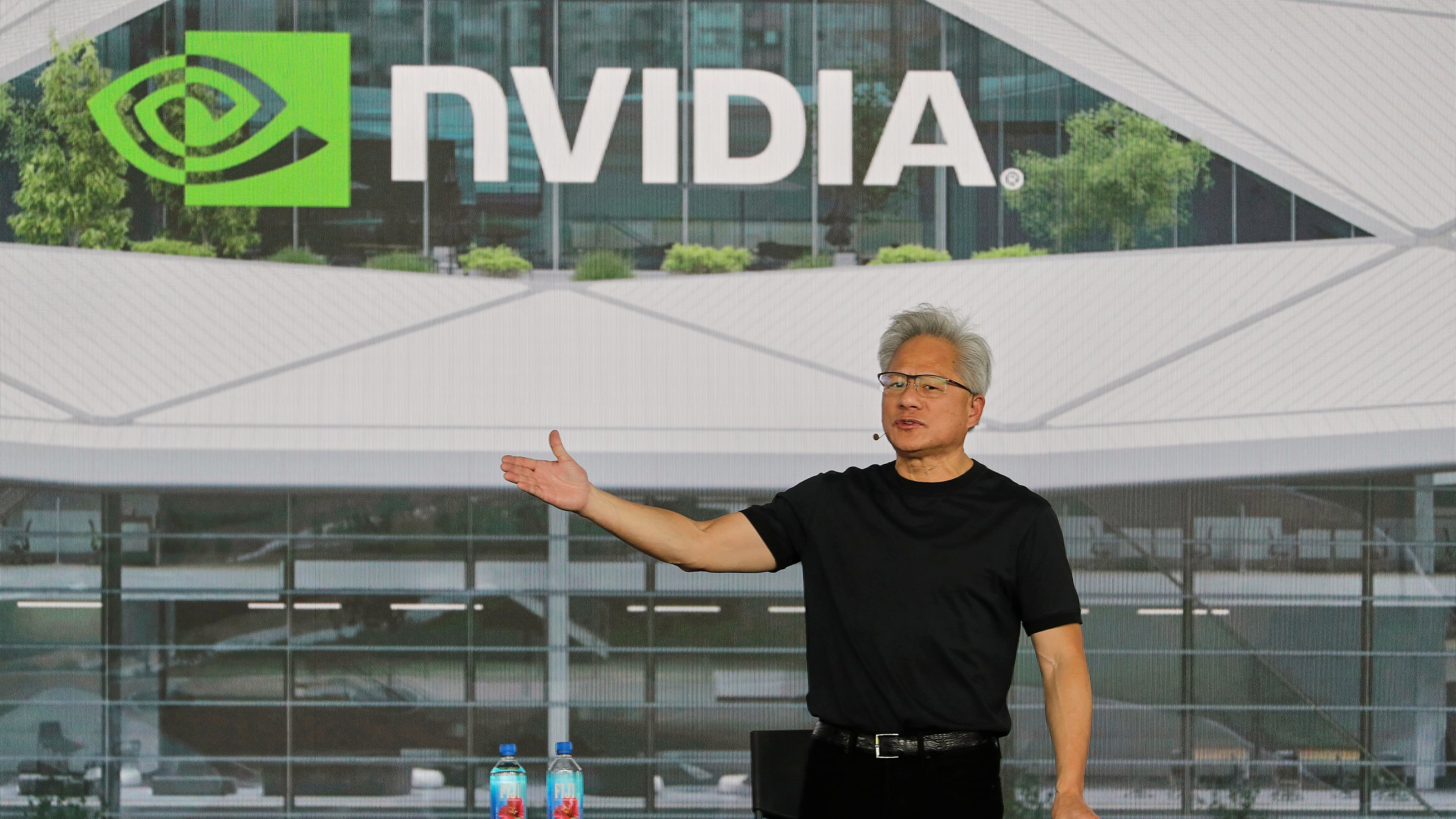 Nvidia CEO Jensen Huang delivers a speech during an all employee celebration at the construction site of their Taiwan headquarters "Constellation"¨ in Taipei, Taiwan, Wednesday, May 27, 2026. (AP Photo/Chiang Ying-ying)
