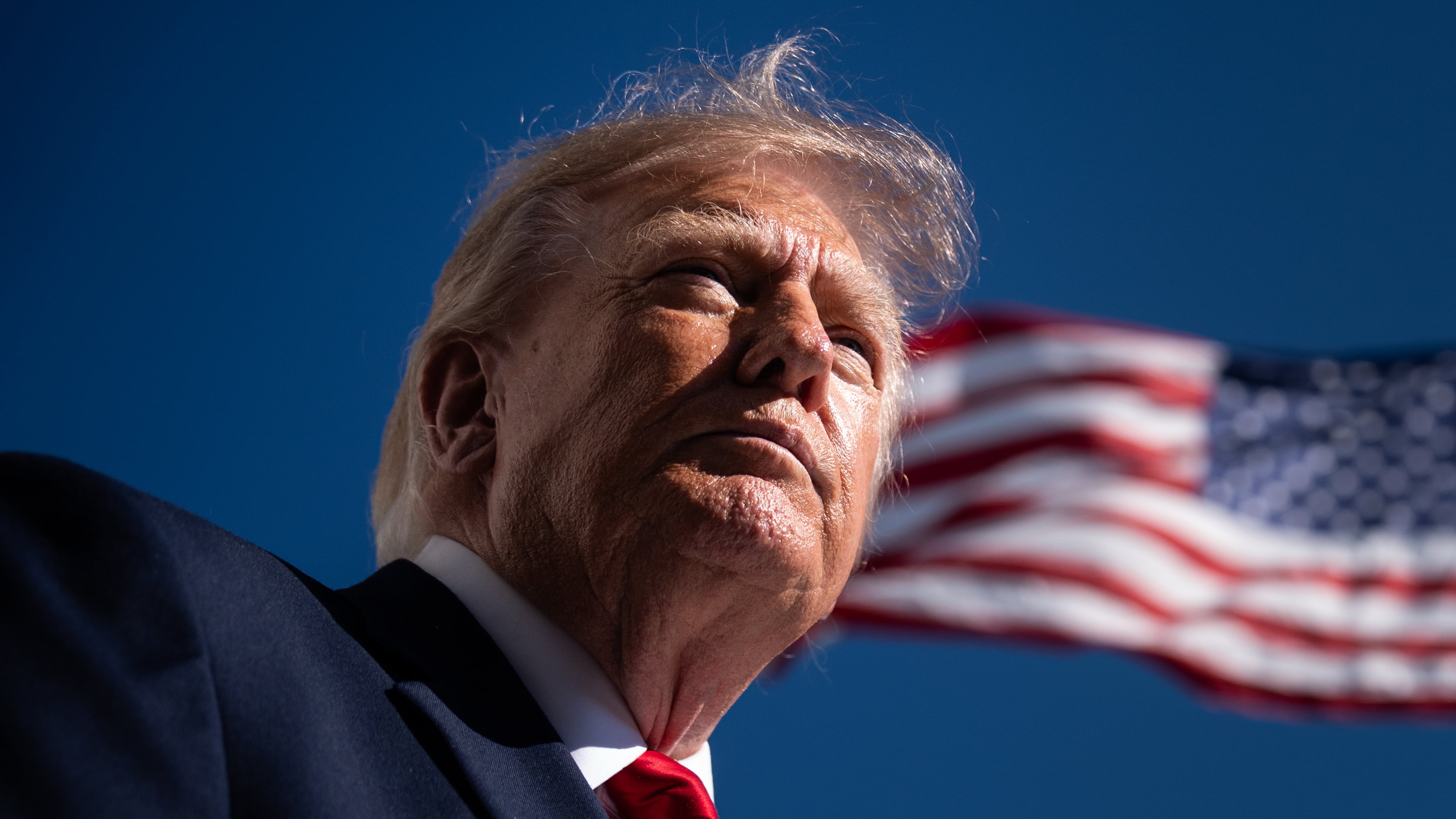 President Donald Trump speaks with reporters before boarding Marine One on the South Lawn of the White House, Wednesday, Oct. 7, 2026, in Washington. (AP Photo/Julia Demaree Nikhinson)