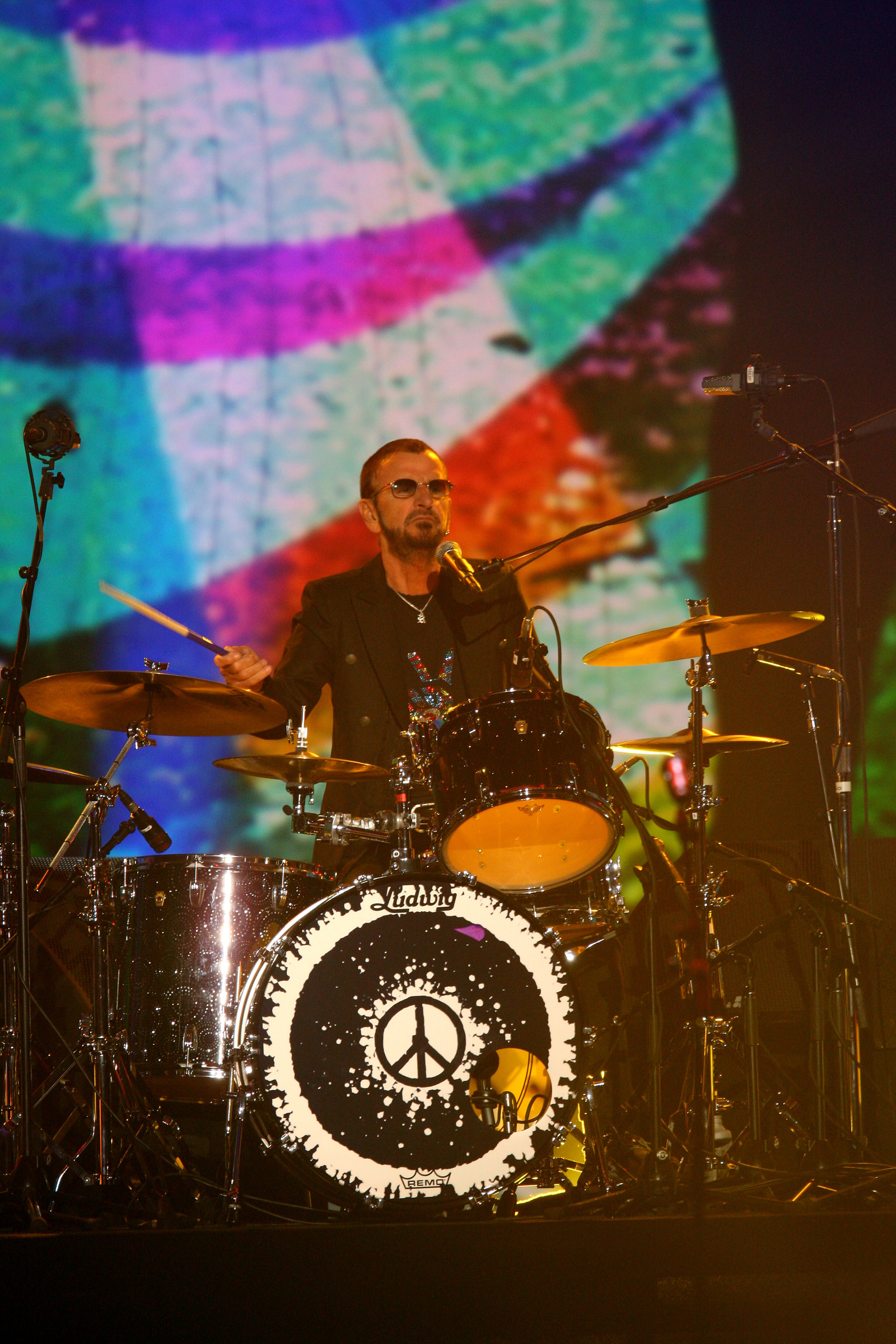 Ringo Starr performs at The Night That Changed America: a Grammy Salute to the Beatles, on Monday, Jan. 27, 2014, in Los Angeles. (Photo by Zach Cordner/Invision/AP)
