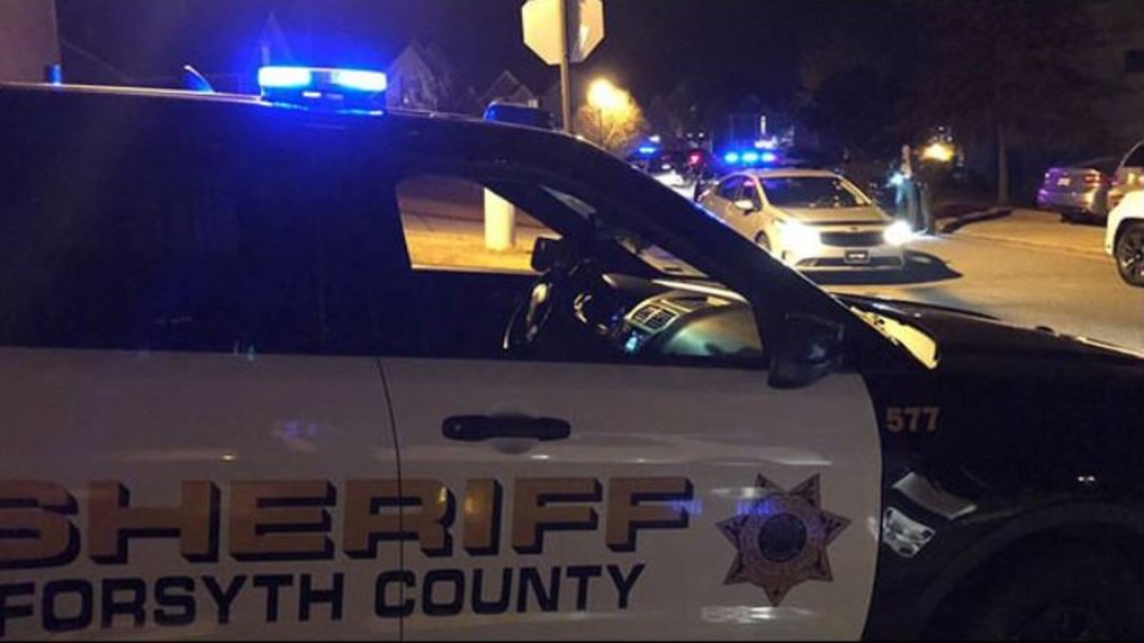 The suspect left the Forsyth County home after the shooting with a 2-week-old baby that reportedly is his son, a sheriff’s spokesman said.