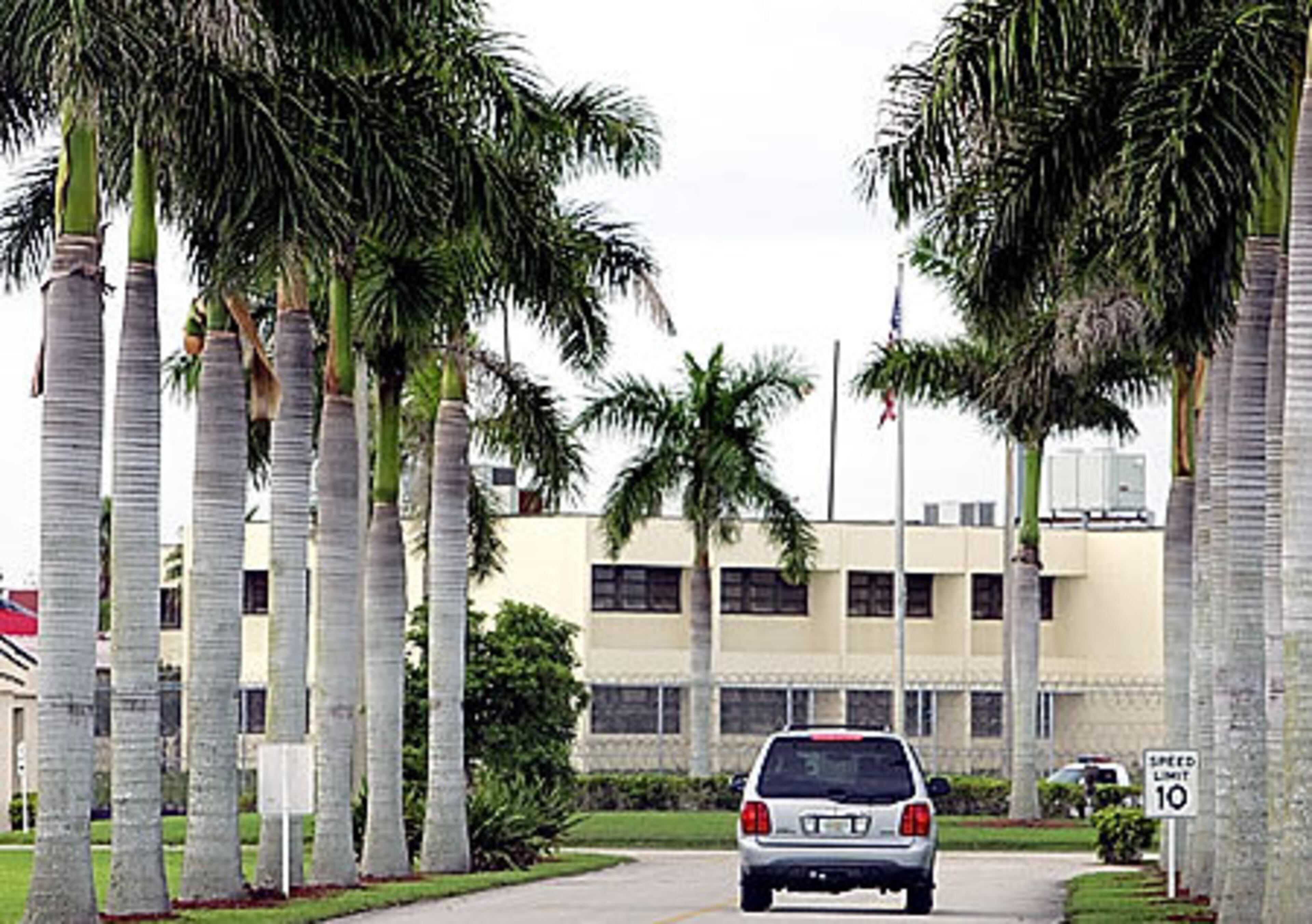 A vehicle carrying the former Atlanta Mayor Bill Campbell arrives at the Satellite Prison Camp in Miami on Monday, Aug. 17, 2006. Campbell voluntarily surrendered to begin serving a 30 month sentence for tax evasion at the minimum security facility.