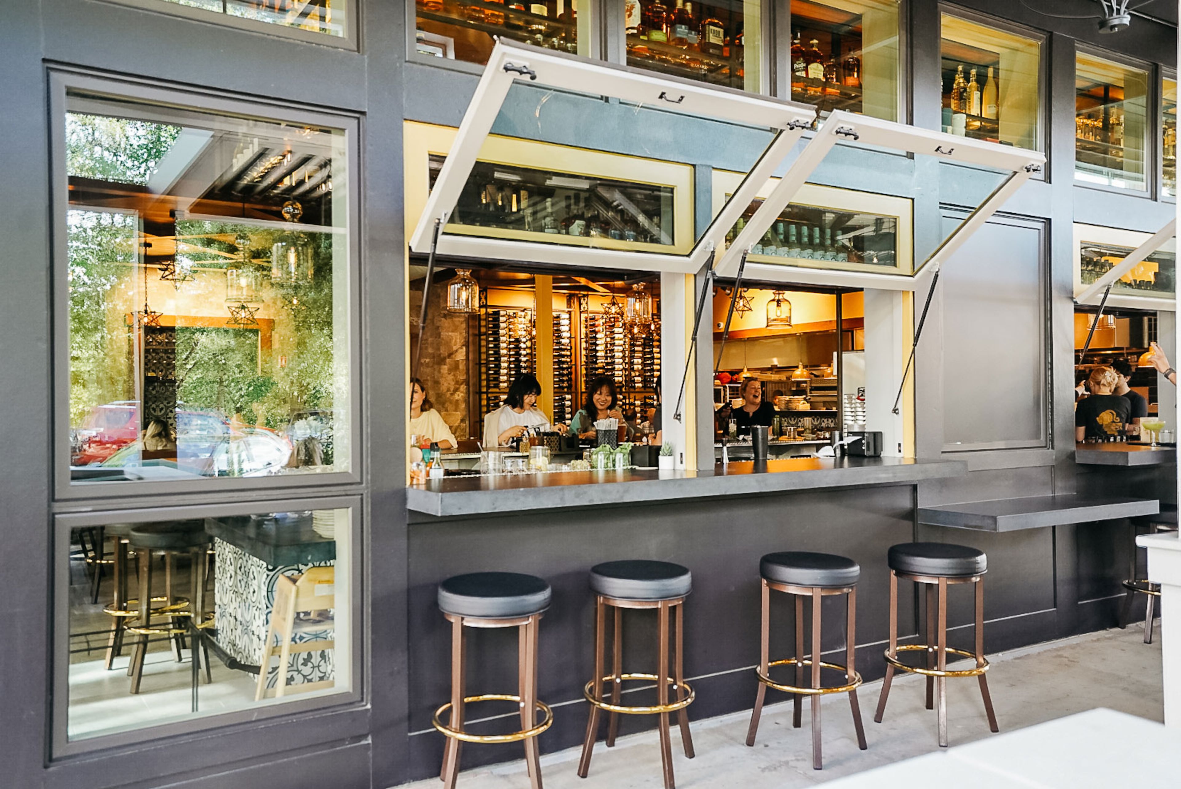 The bar at Fogon & Lions offers outdoor sidewalk seating.