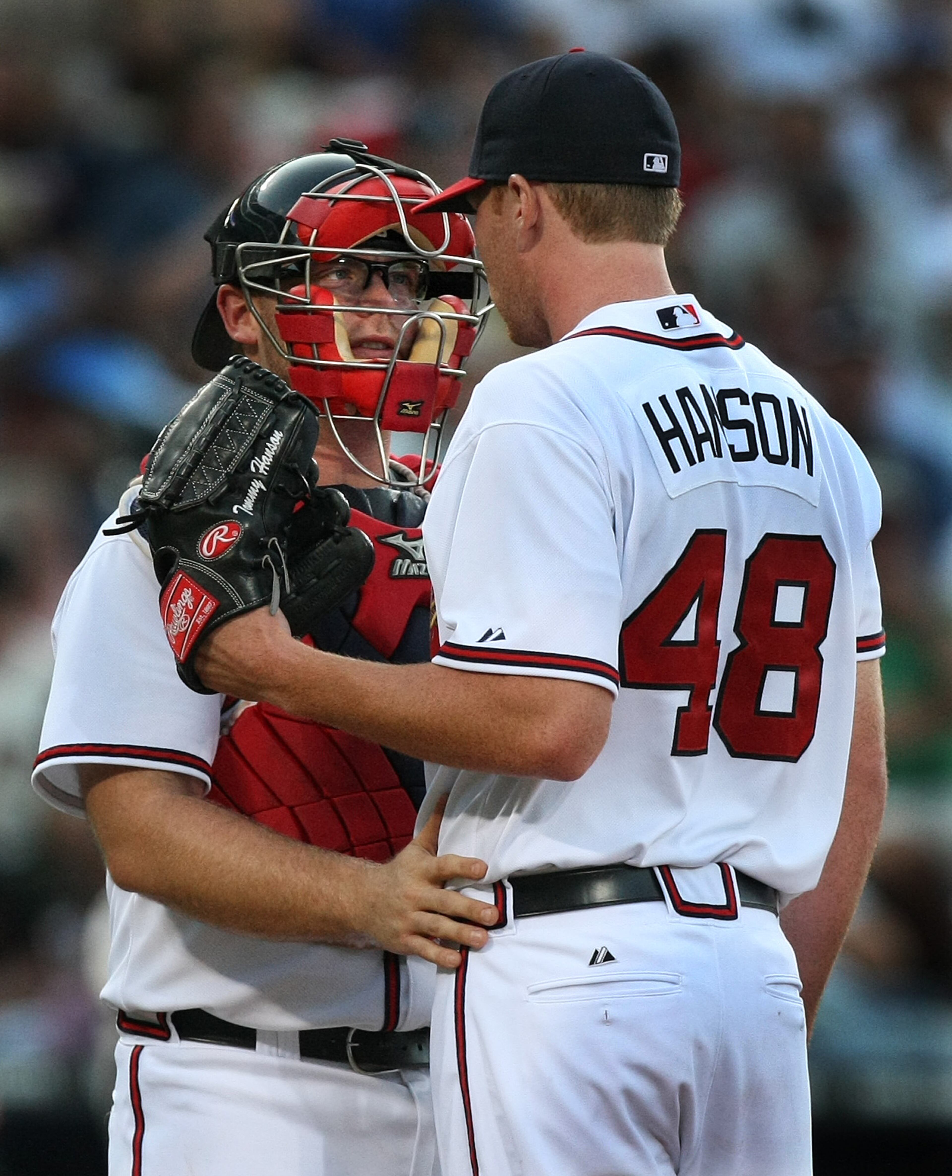 Braves catcher Brian McCann has a chat with pitcher Tommy Hanson after he walked the Giants pitcher Jonathan Sanchez to load the bases in the 2nd inning at Turner Field in Atlanta, Monday, July 20, 2009. Curtis Compton, ccompton@ajc.com